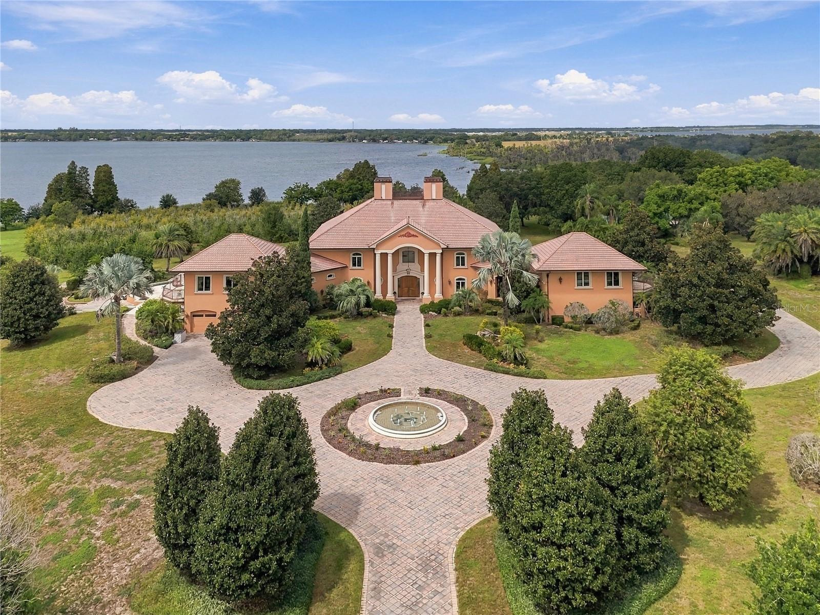 A rare opportunity to own one of Auburndales most impressive private estates. Set on 44.30 beautifully landscaped acres with more than 2,300 feet of water frontage, this remarkable property offers unmatched privacy, scale, and natural beauty. A rare opportunity to own one of Auburndales most impressive private estates. Set on 44.30 beautifully landscaped acres with more than 2,300 feet of water frontage, this remarkable property offers unmatched privacy, scale, and natural beauty.