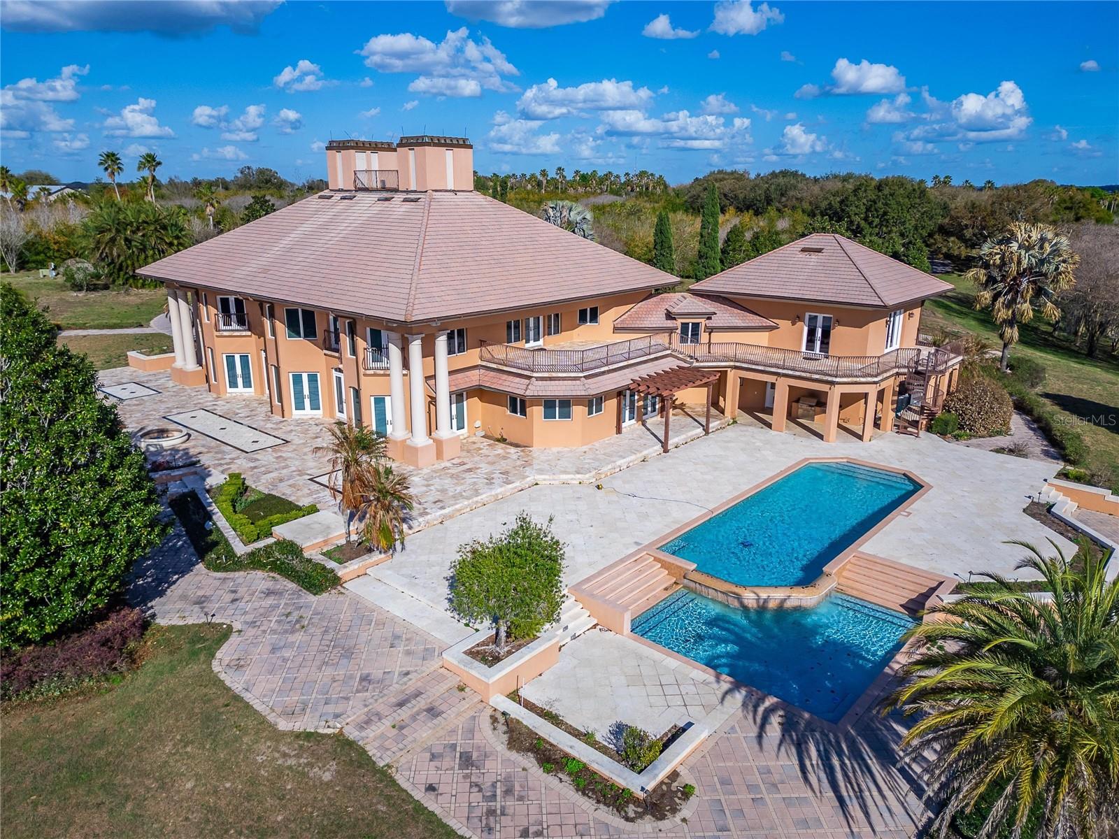 A rare opportunity to own one of Auburndales most impressive private estates. Set on 44.30 beautifully landscaped acres with more than 2,300 feet of water frontage, this remarkable property offers unmatched privacy, scale, and natural beauty. A rare opportunity to own one of Auburndales most impressive private estates. Set on 44.30 beautifully landscaped acres with more than 2,300 feet of water frontage, this remarkable property offers unmatched privacy, scale, and natural beauty.