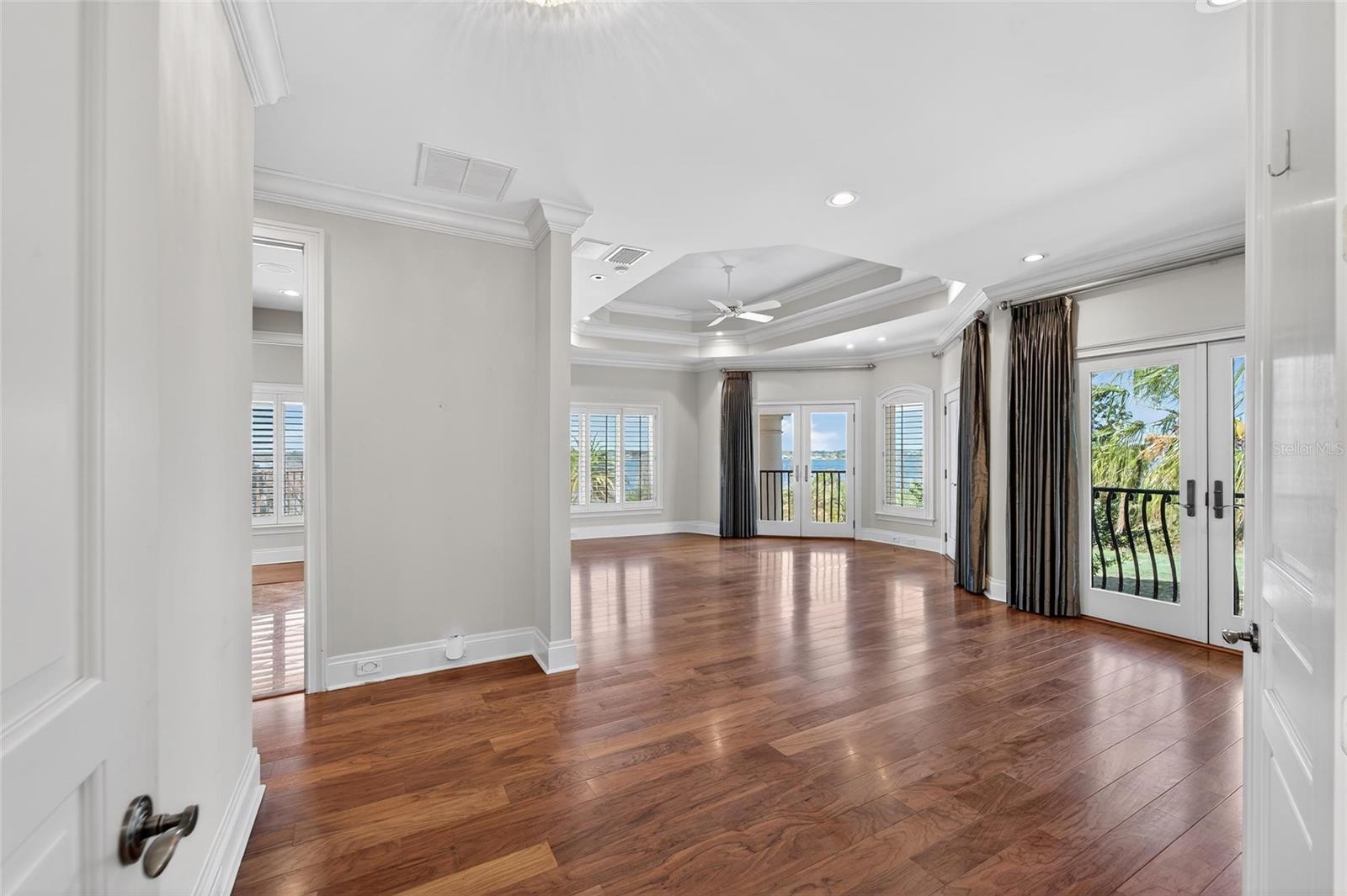 Upstairs Primary Suite showing balconies