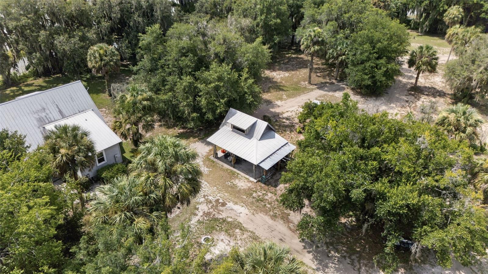 AERIAL OF THE DOG TROT DUPLEX AND SHED BANNON ISLAND L4961212