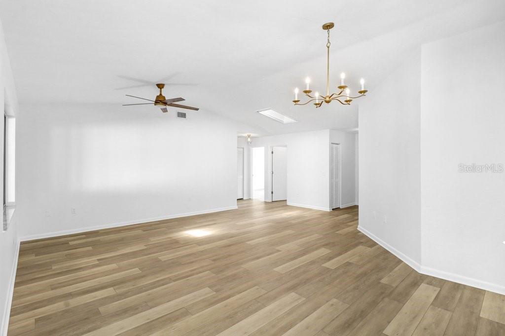 View from Kitchen/Dinette to living Dining room and hall leading to bedrooms.