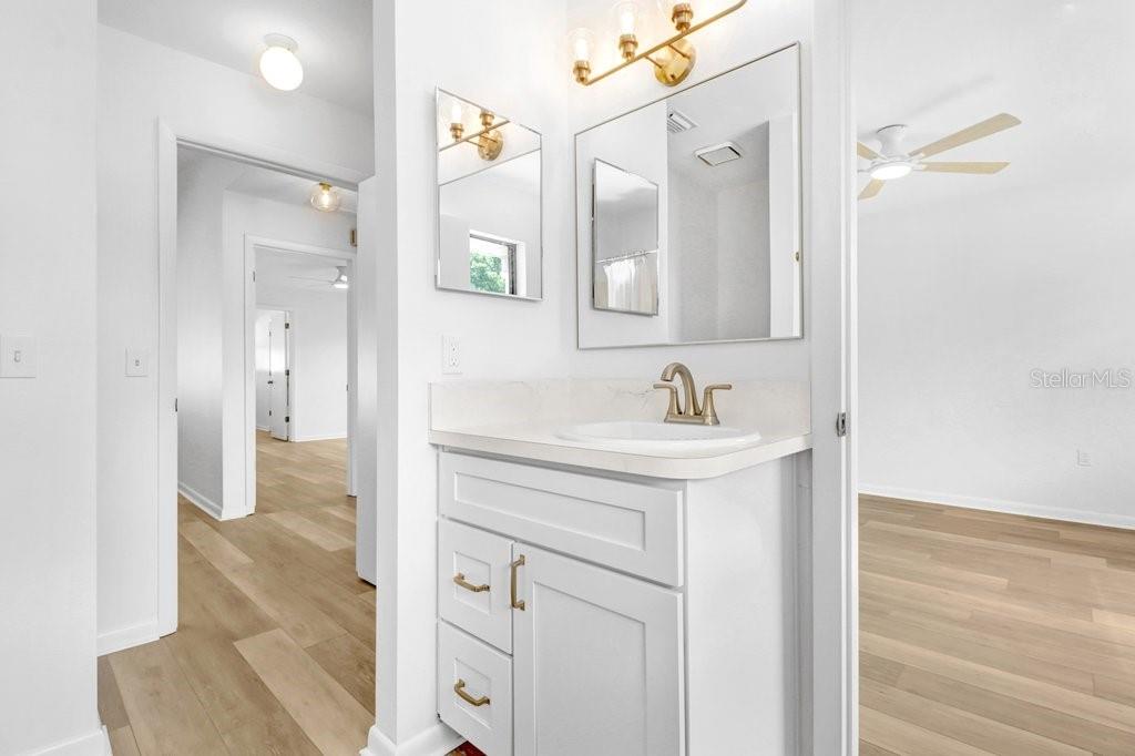Jack and Jill Bathroom with shower tub combo and linen closet is directly accessible from the Hall and the second bedroom. Jack and Jill Bathroom with shower tub combo and linen closet is directly accessible from the Hall and the second bedroom.