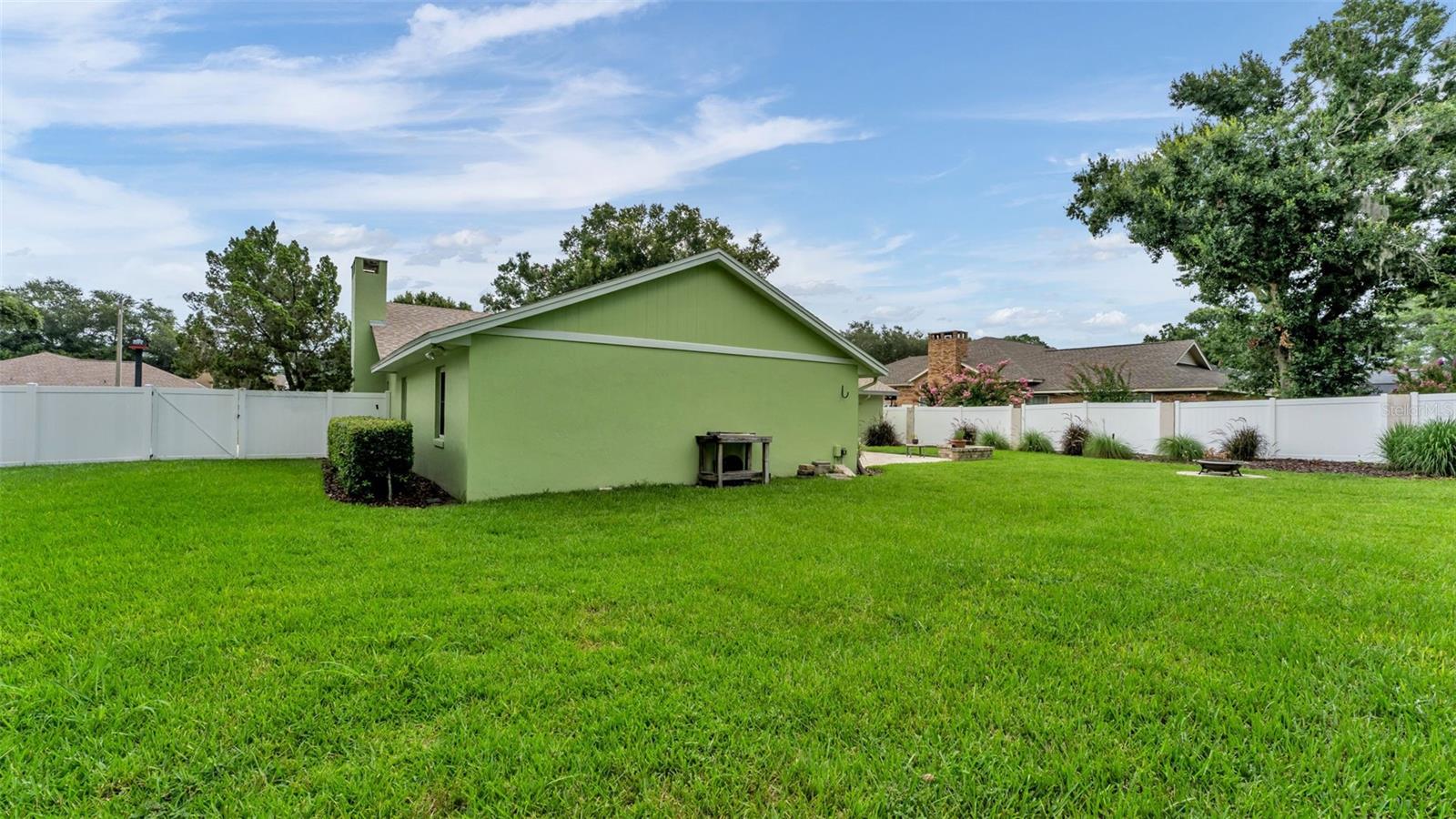 expansive fenced backyard
