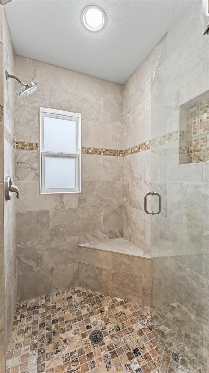Upgraded remodeled shower in primary suite