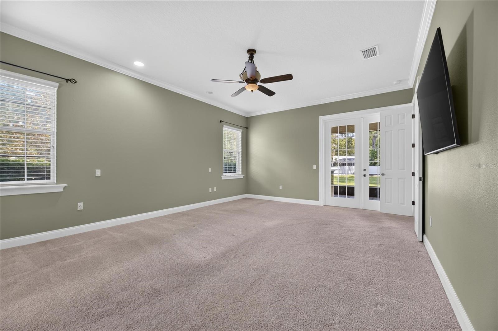 French doors leading out to Screened in Porch