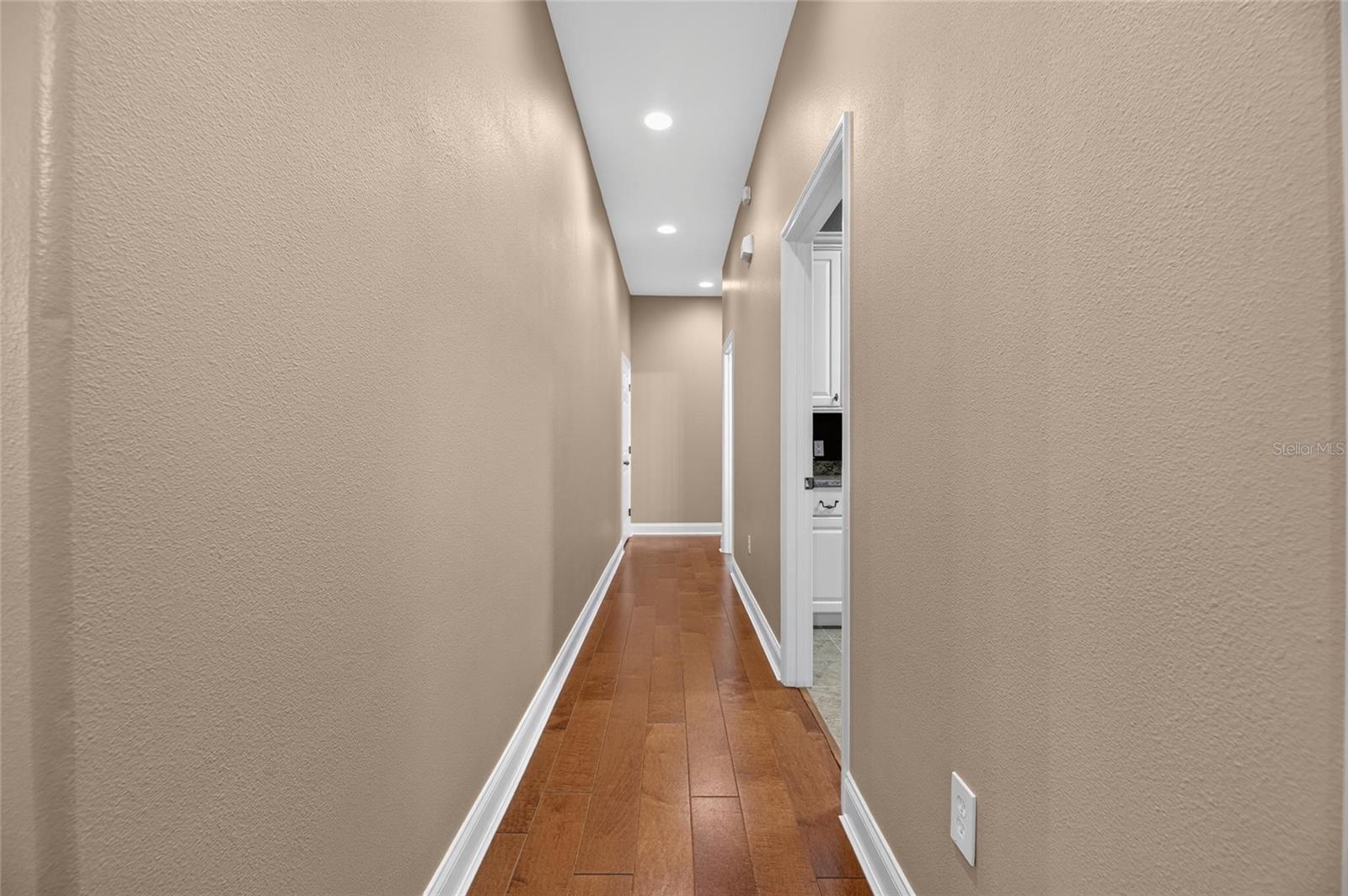 Hallway going down to guest suite