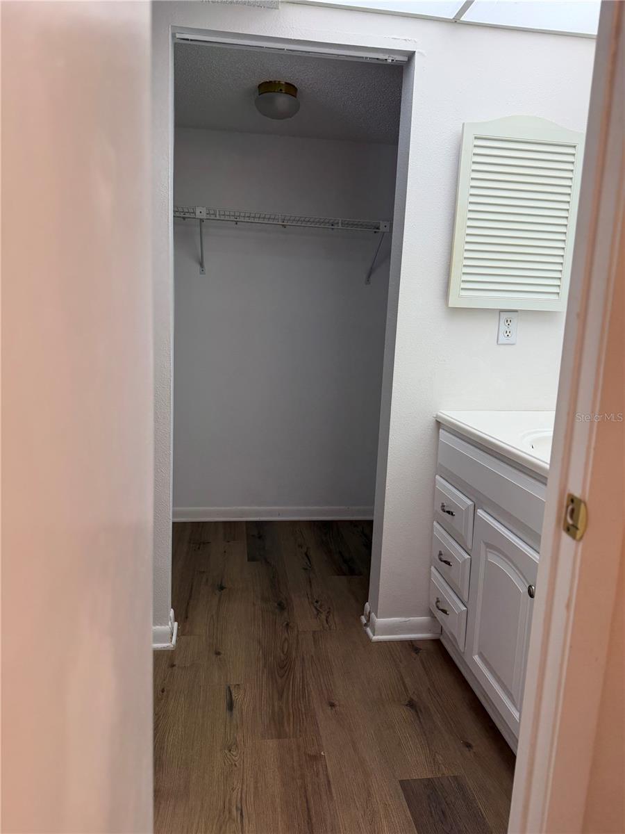 Primary Bathroom with Walk-In Closet