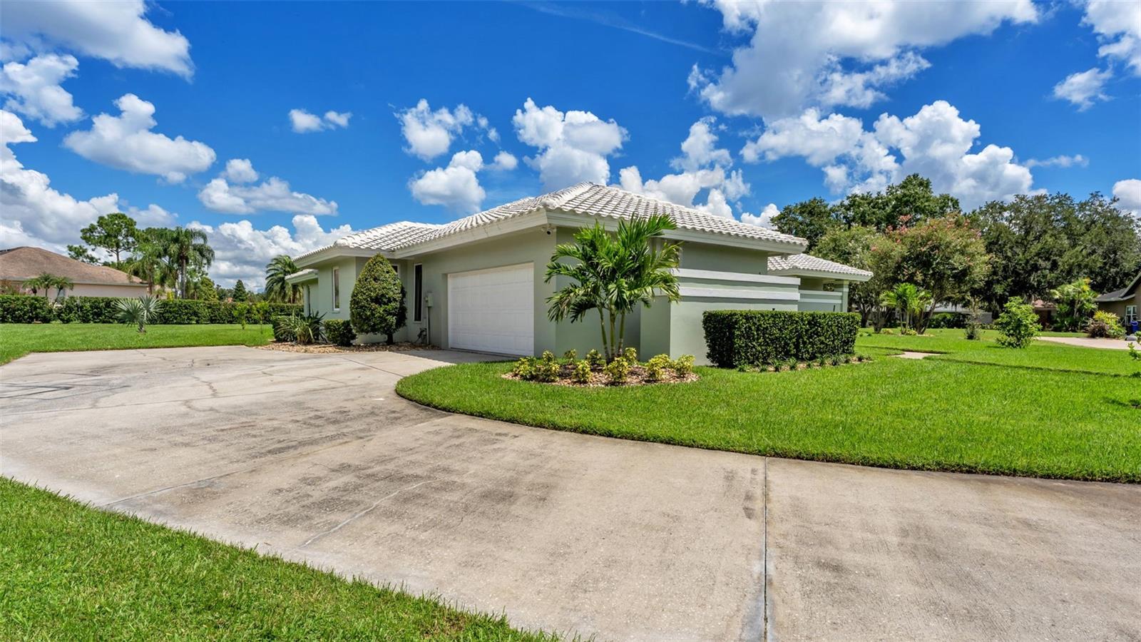 Oversized driveway and side entry garage