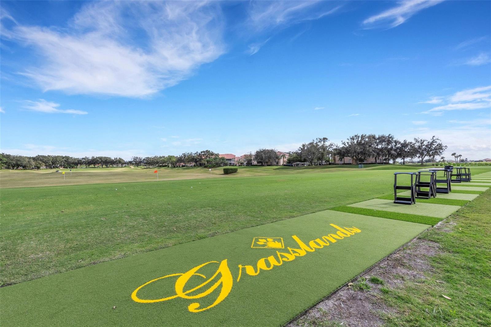 Nearby are the golf practice areas like the driving range.