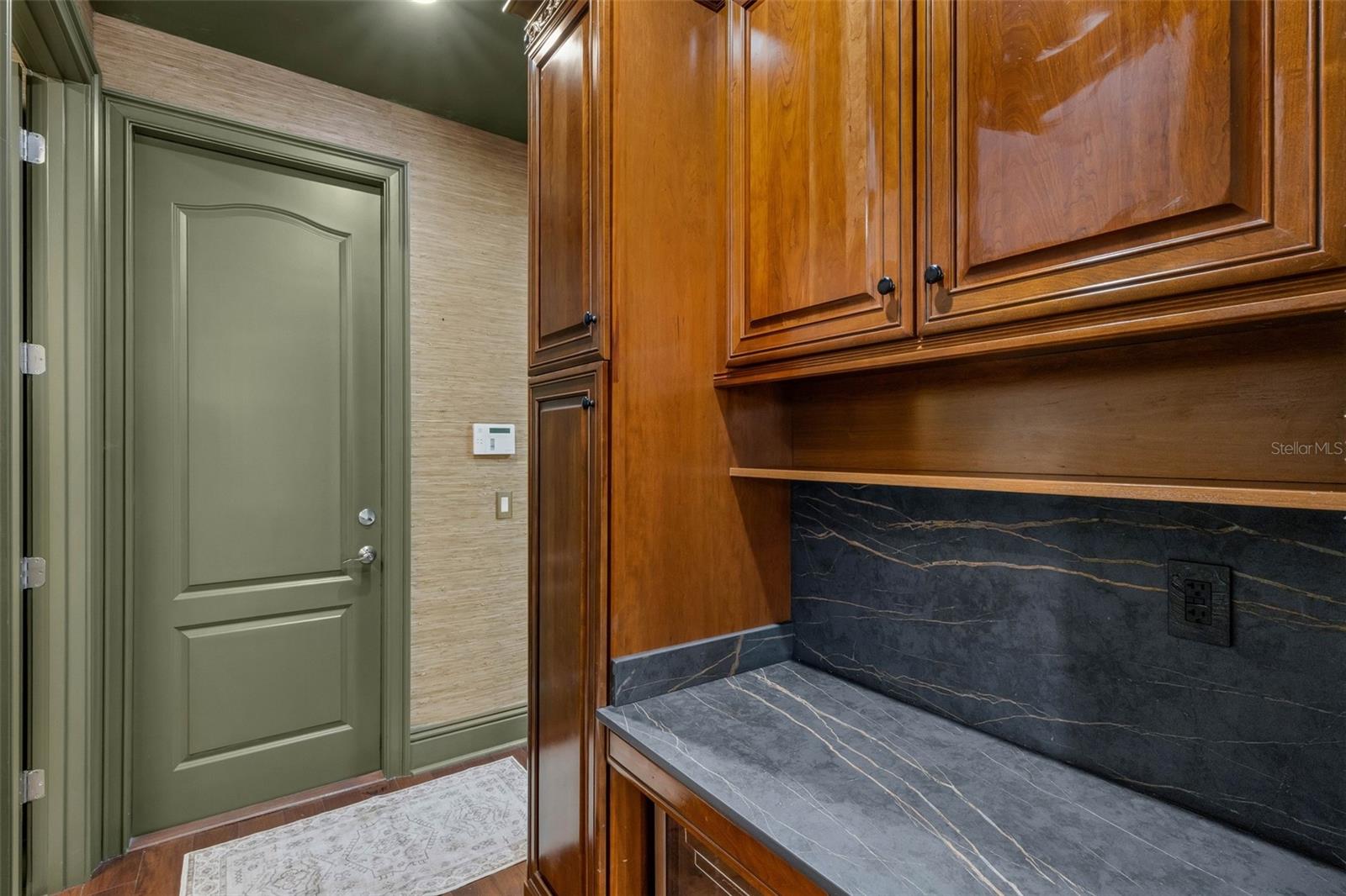 And because life happens there is a large butler's pantry and mudroom . . .