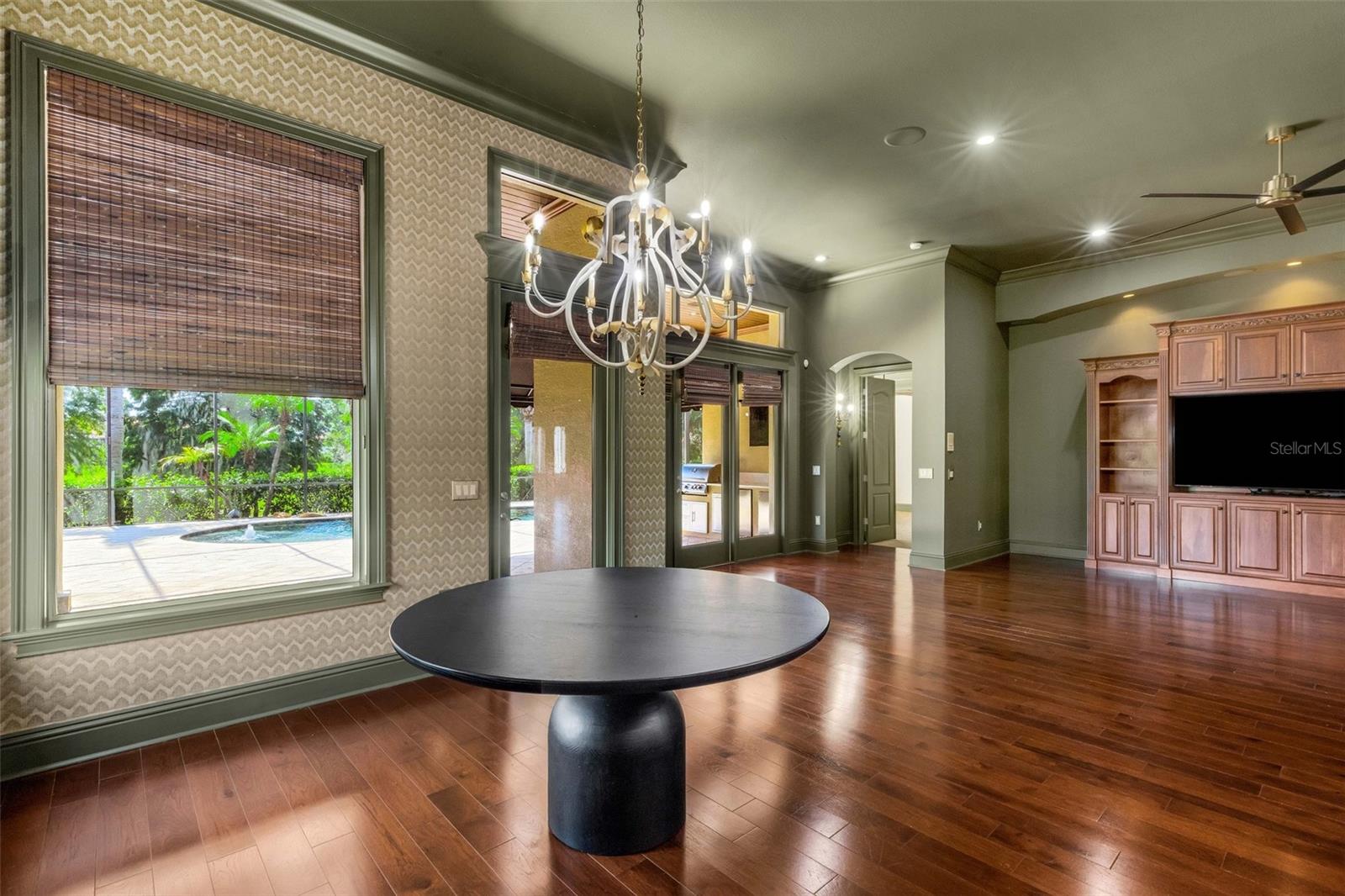 Large windows flood the space with golden natural light.