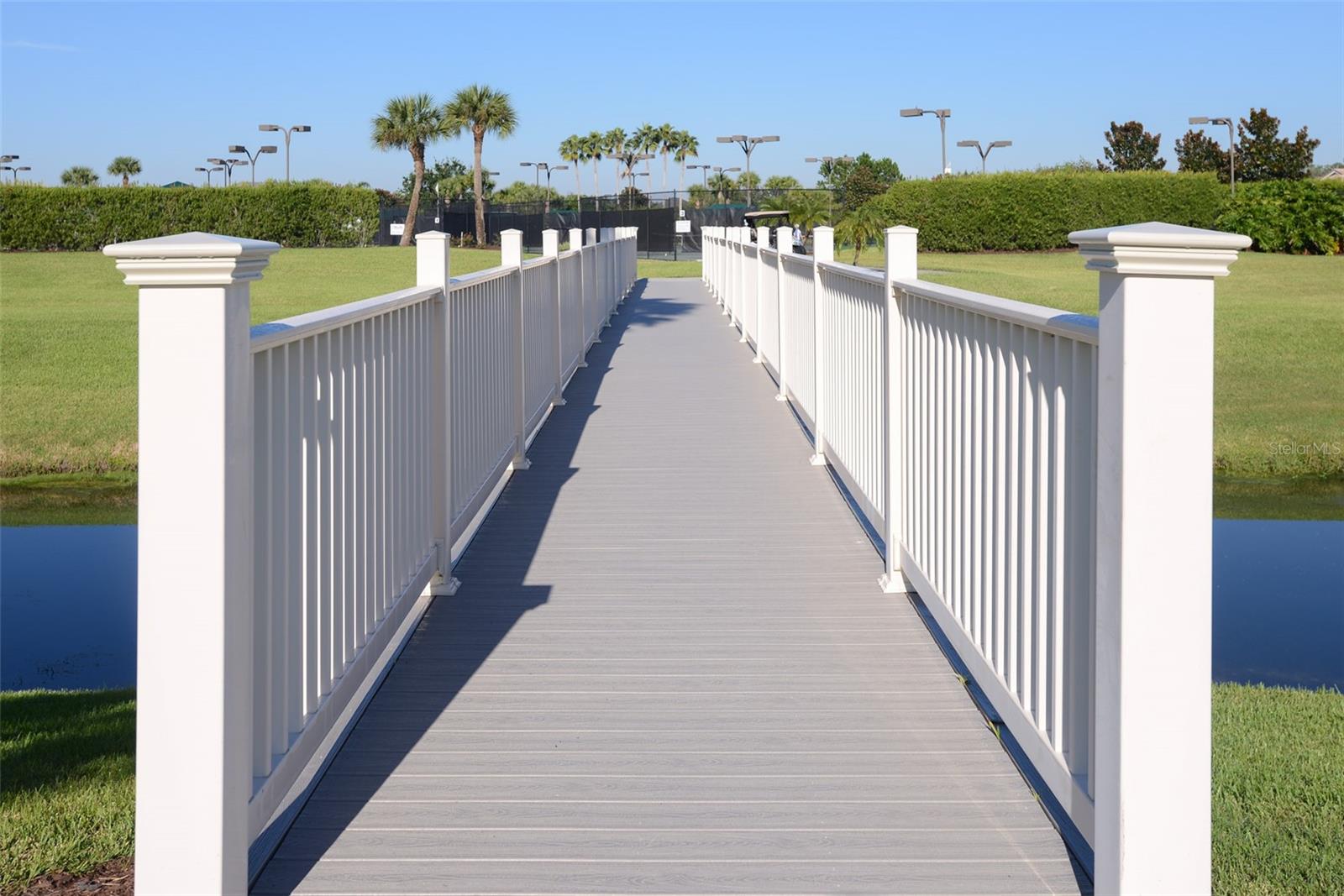 Across the footbridge you'll find the lighted tennis and pickleball courts . . .
