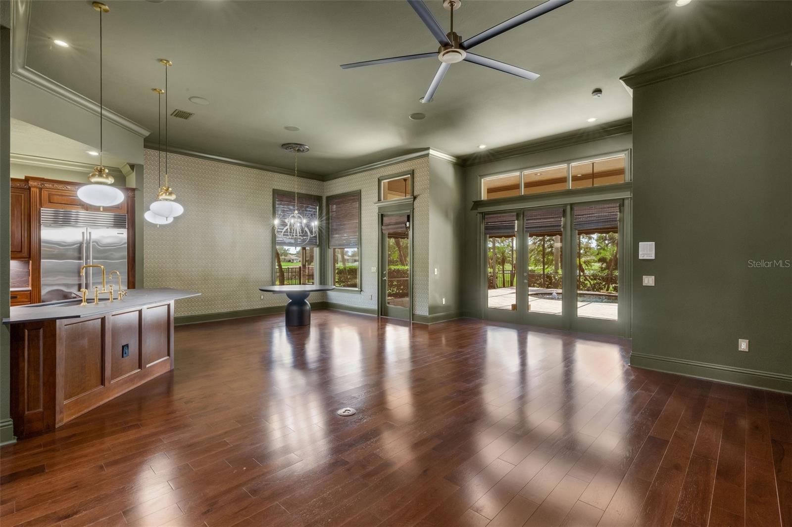 and is directly adjacent to the casual dining area and chef's kitchen.