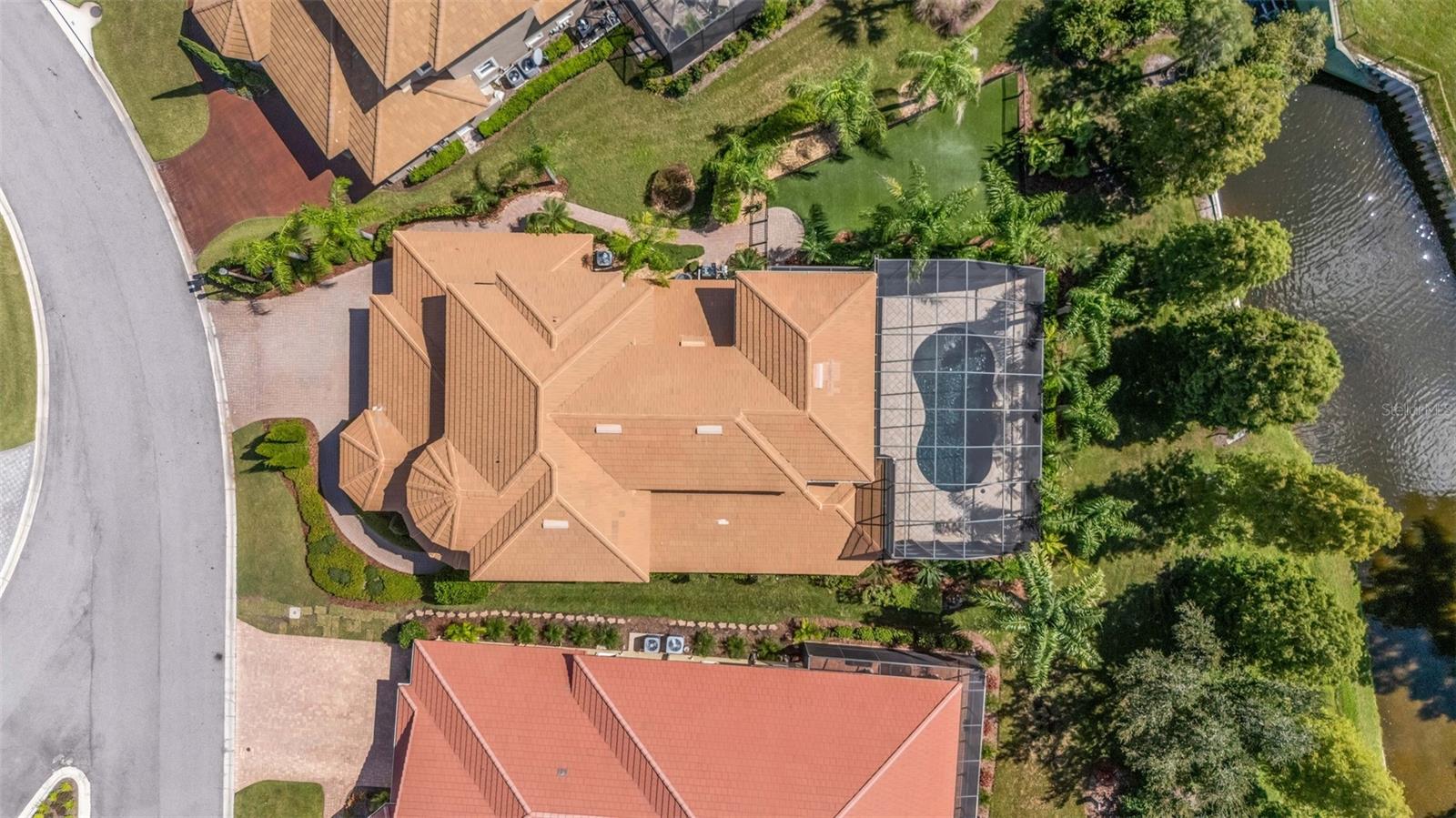 And this beauty is situated at the far end of the street with views of the water and golf course beyond.
