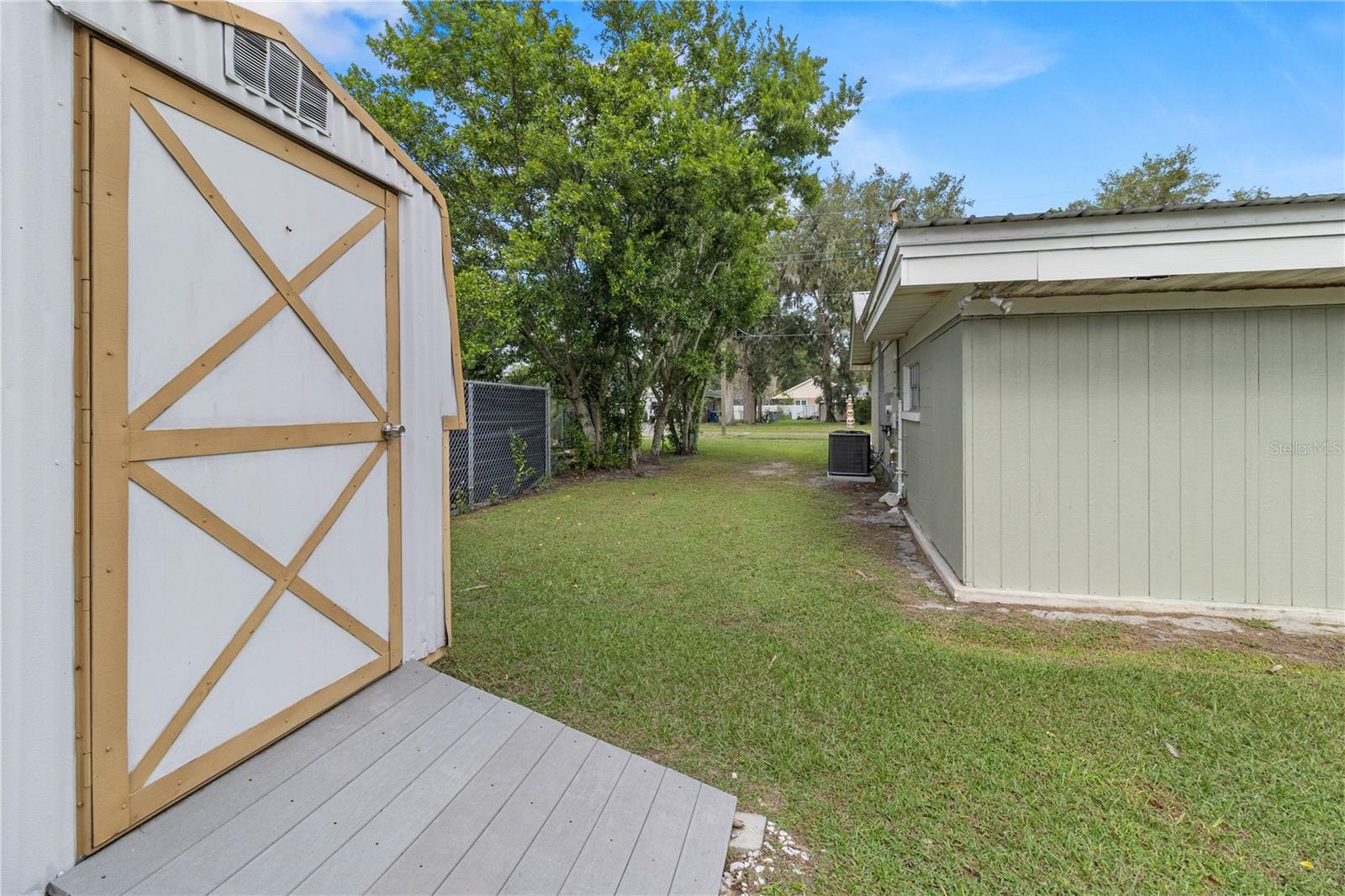 Side yard and view of shed