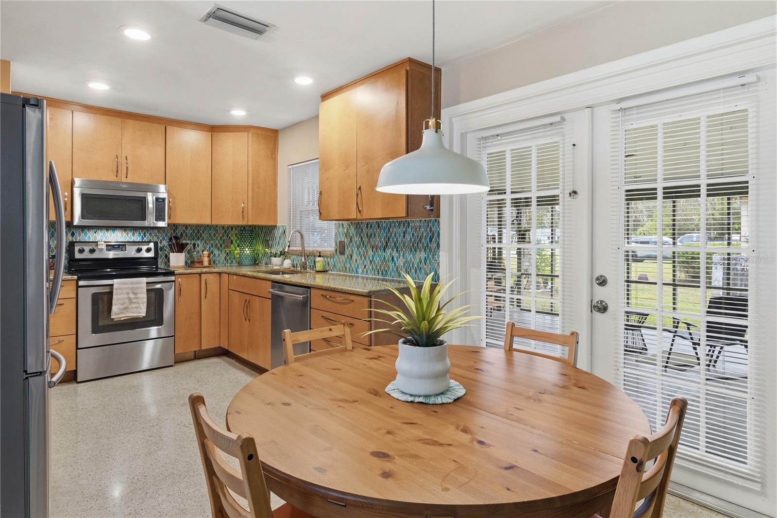 View of kitchen from dining