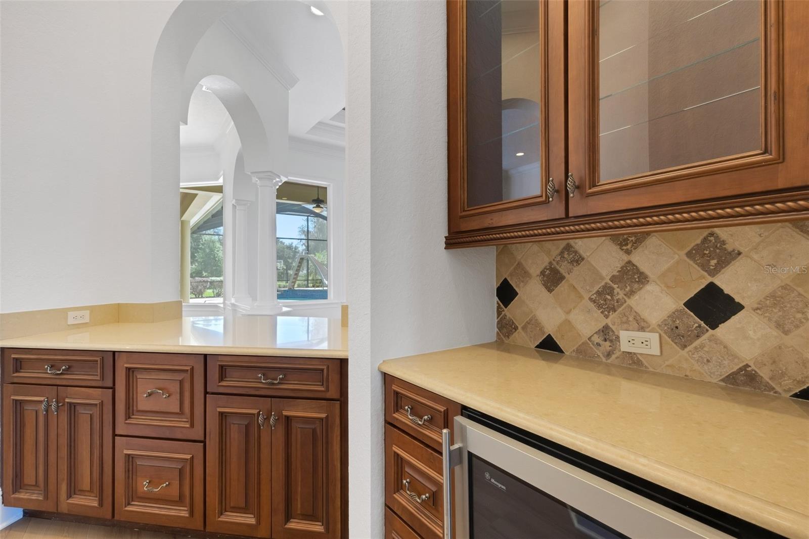 The butler's pantry and bar frees up valuable countertop space when entertaining.