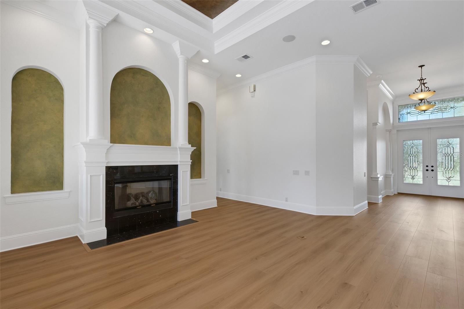 The 12' tall ceilings and gorgeous millwork add to the "luxury" presence of the home. The 12' tall ceilings and gorgeous millwork add to the "luxury" presence of the home.