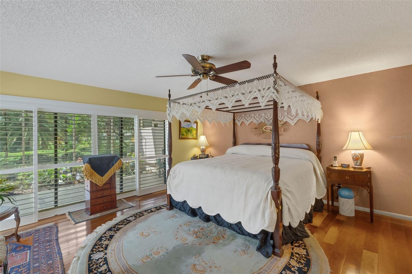 Down a short hallway is the oversized primary suite . . .