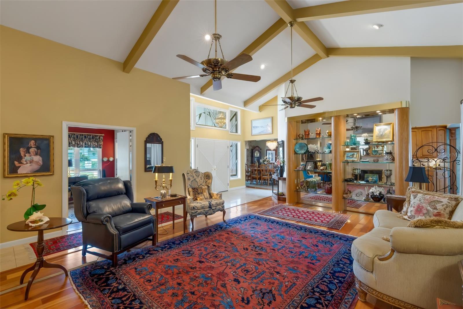 Volume ceiling adds to the spacious feel of this 20' x 18' room.