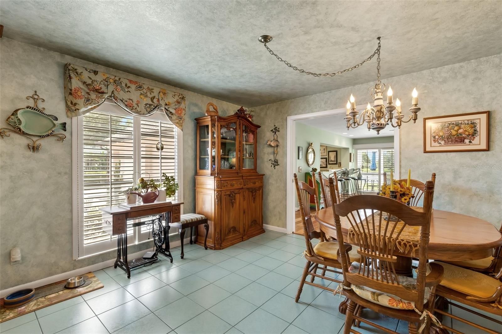 The kitchen also includes a casual dining space and large picture window to bring in that glorious natural light.