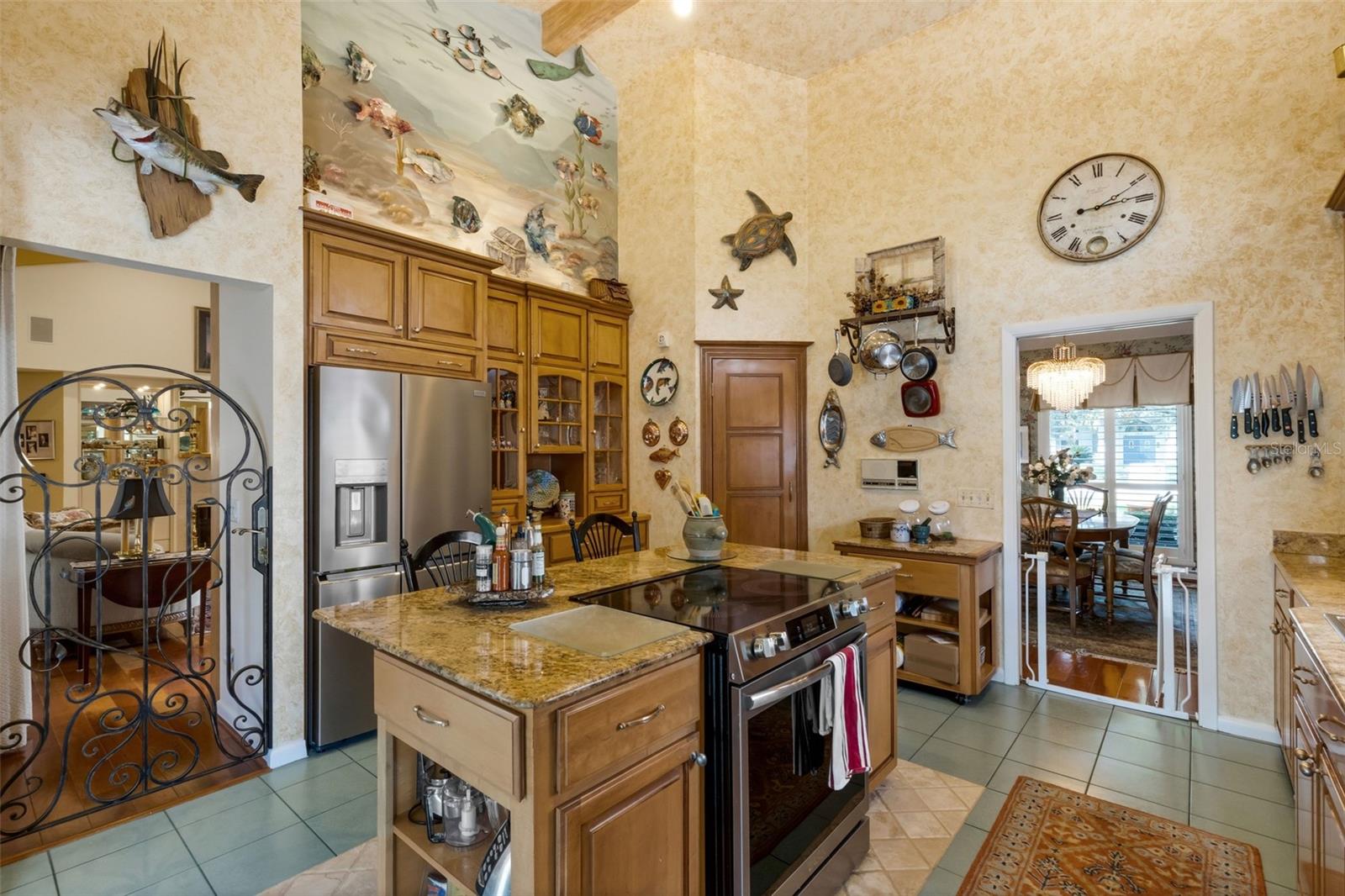 that includes a corner walk-in pantry, newer appliances, granite countertops . . .