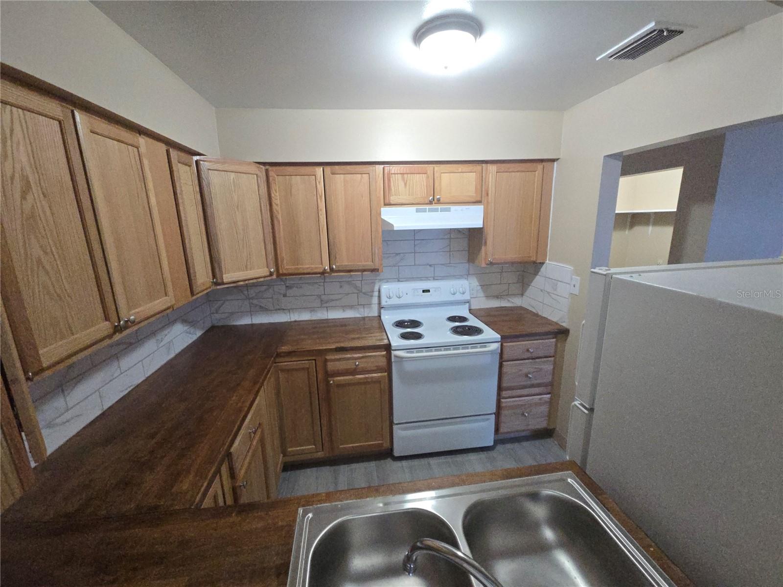1334 KITCHEN - VIEW FROM DINING AREA