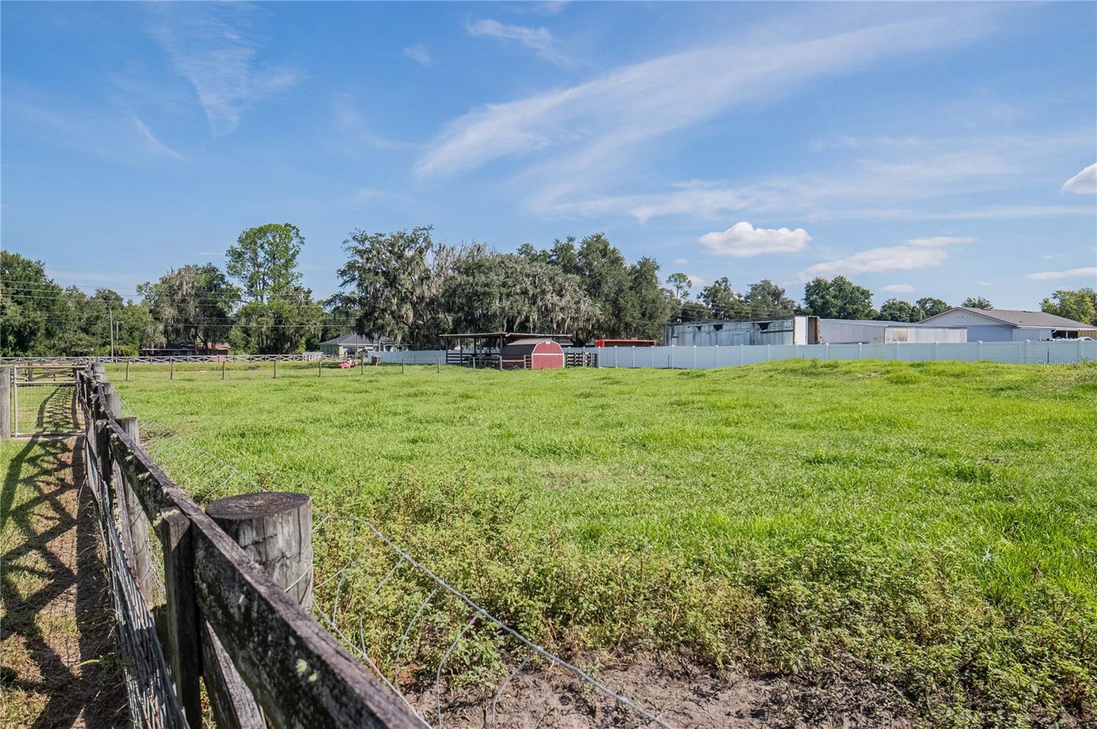 View of Pole barn and attached barn