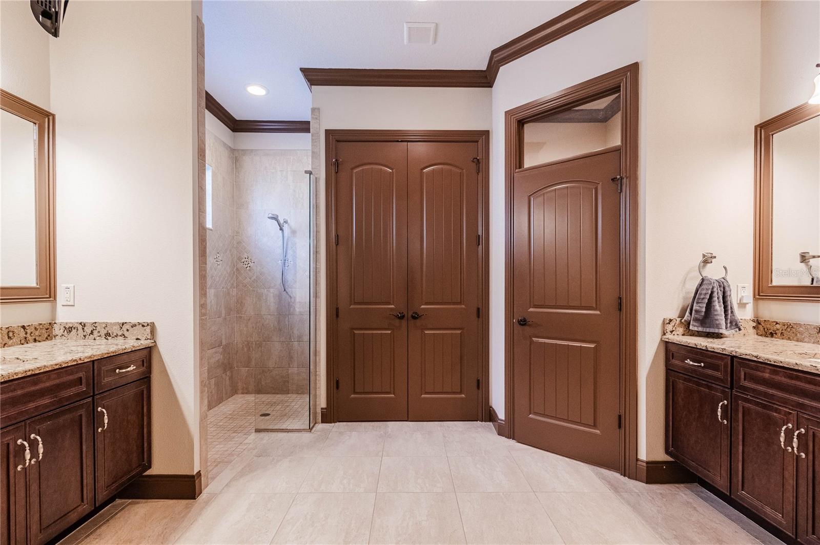 Primary Bathroom w/dual vanities and walk-in shower