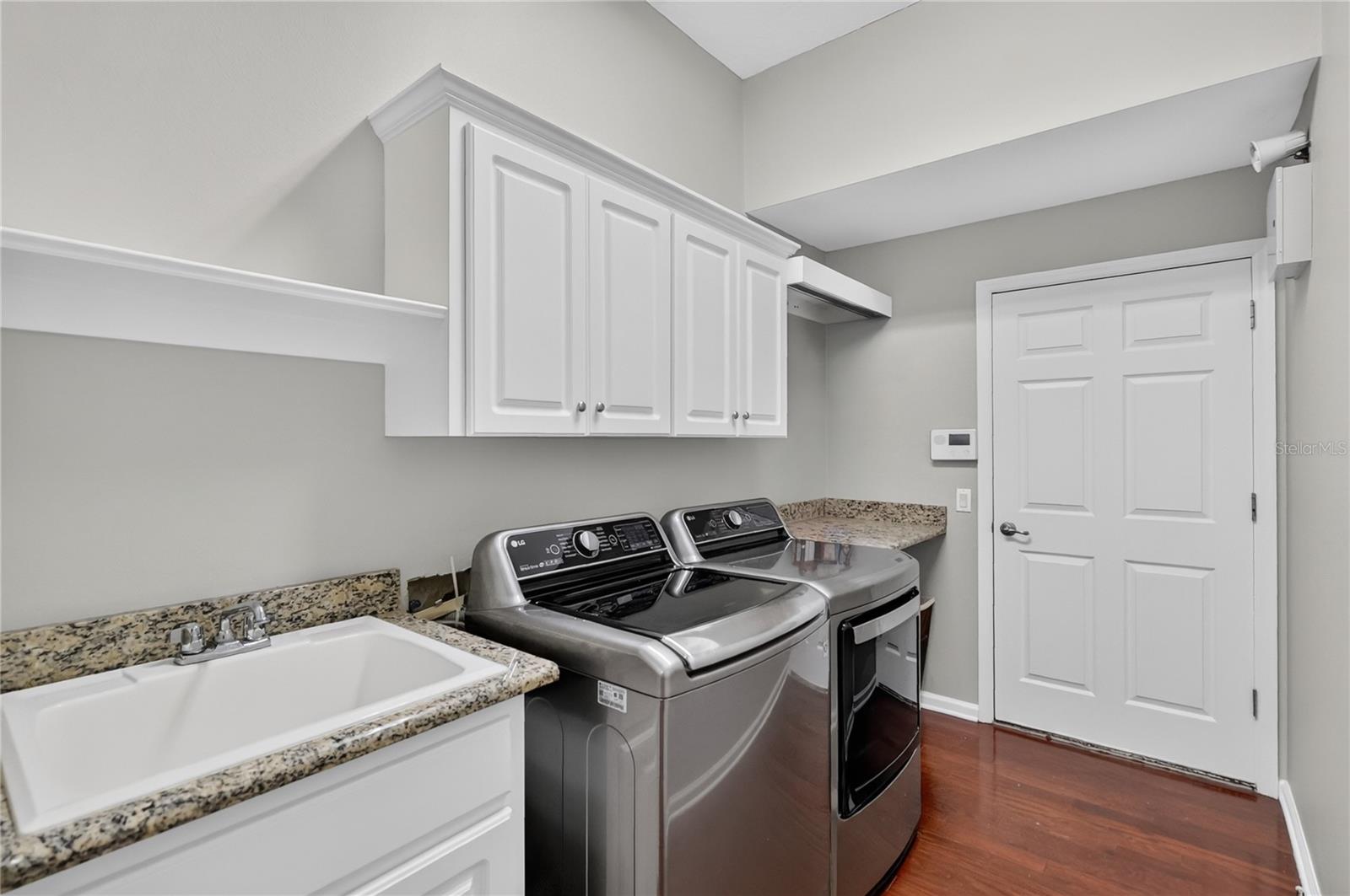 Laundry Room Includes Washer and Dryer