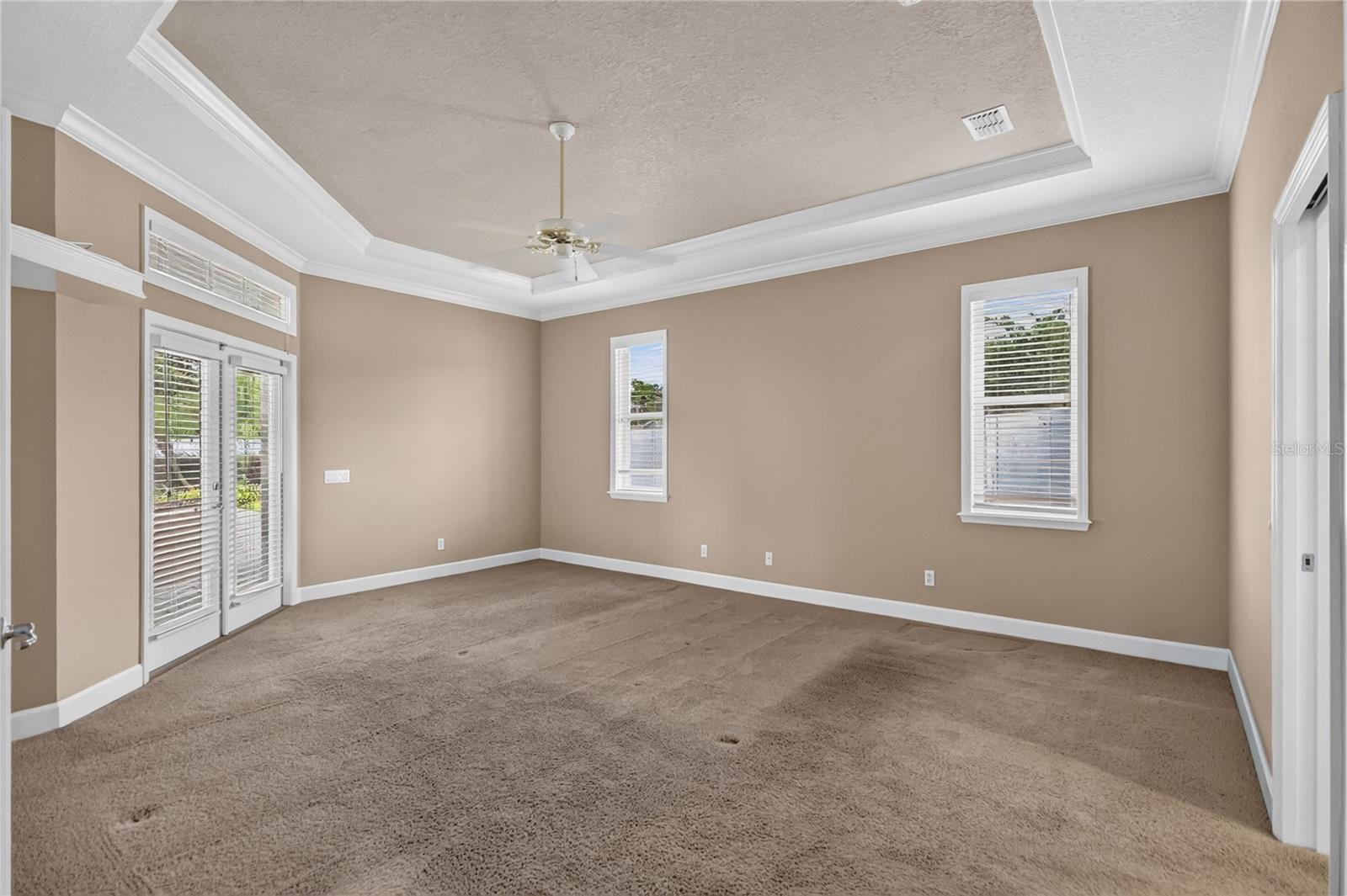 Master Bedroom with French Doors out to Lania