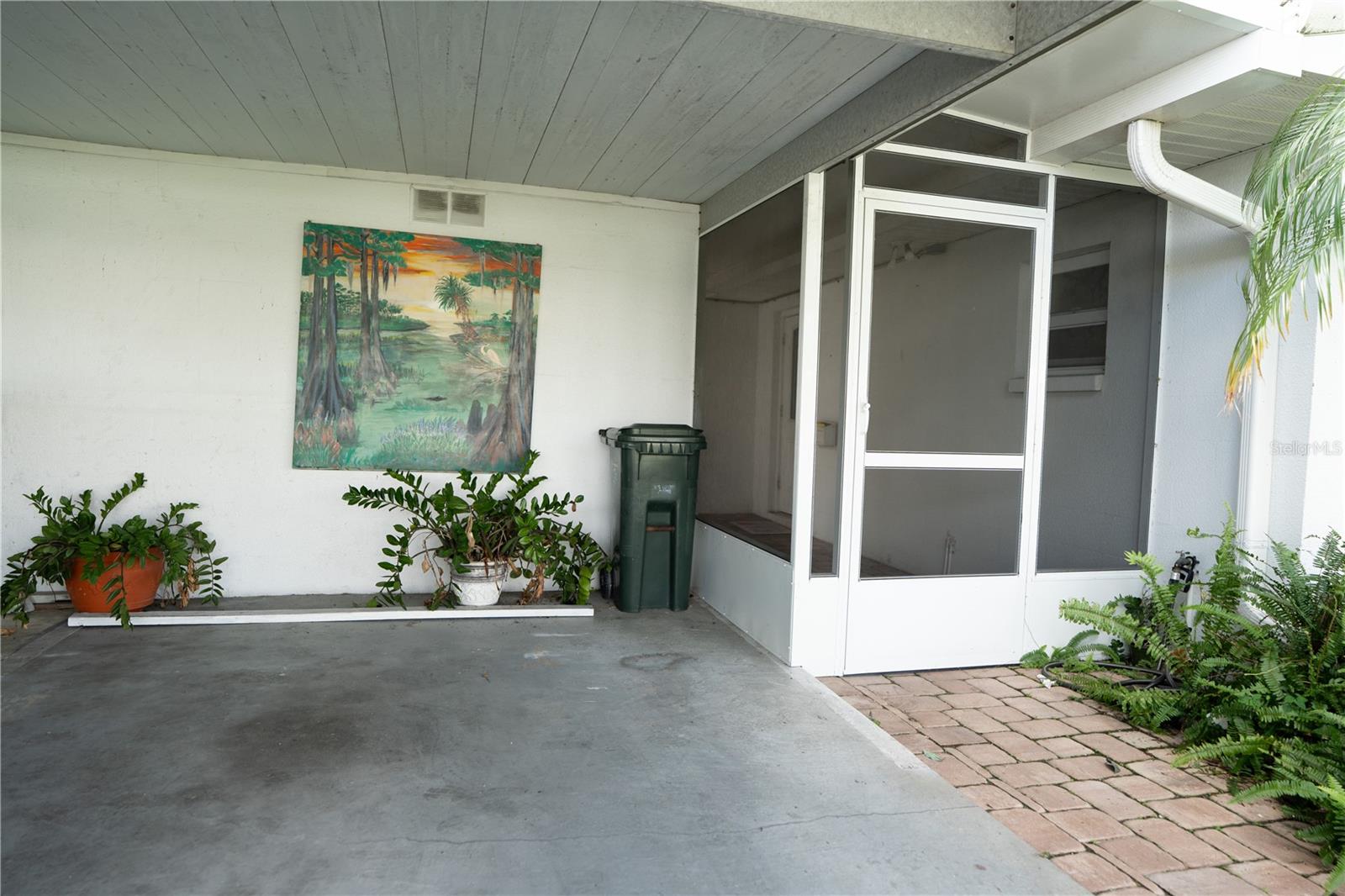 Carport and front porch. Carport and front porch.
