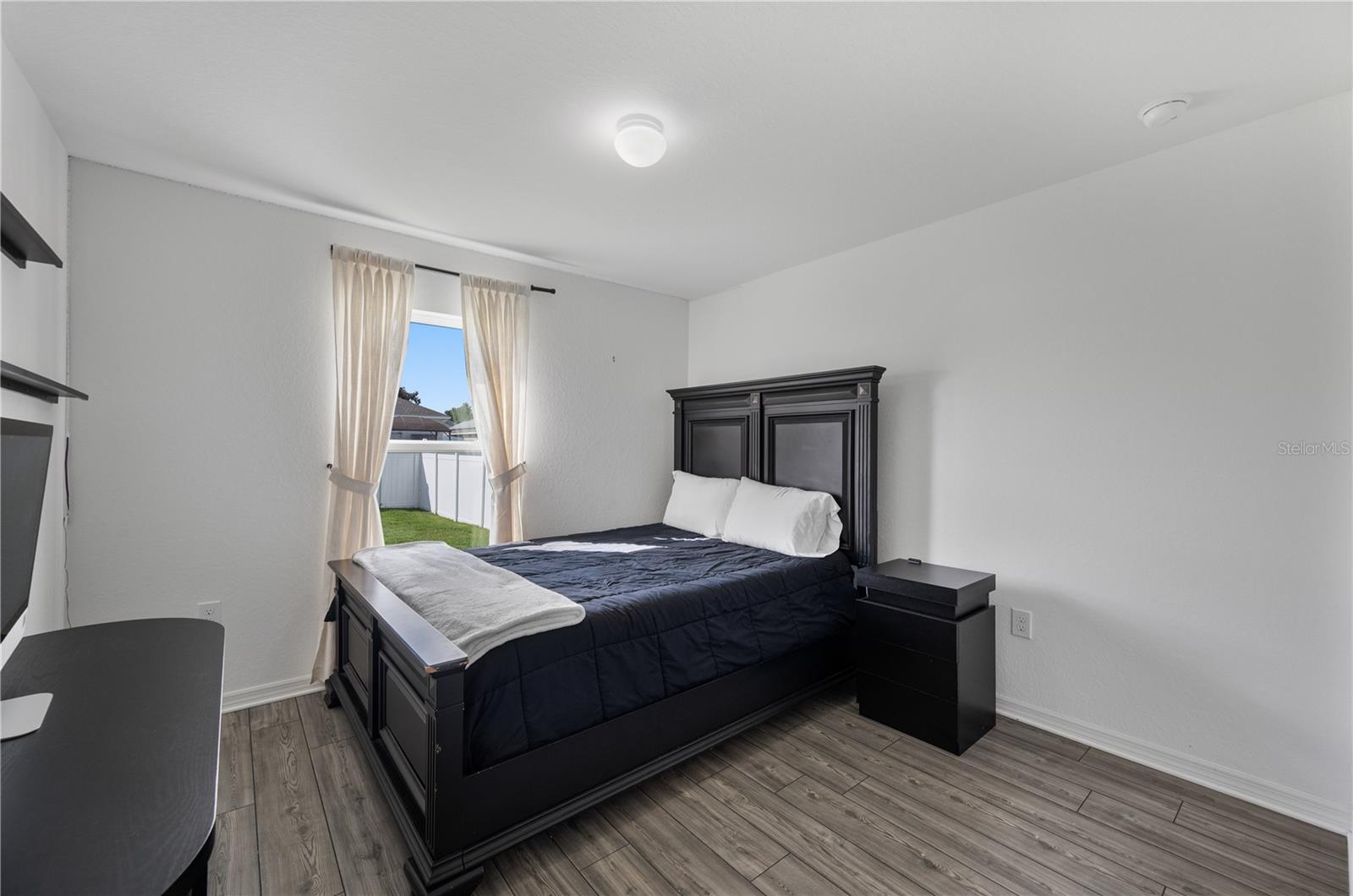 Bedroom #4 is well appointed and features large built in closet