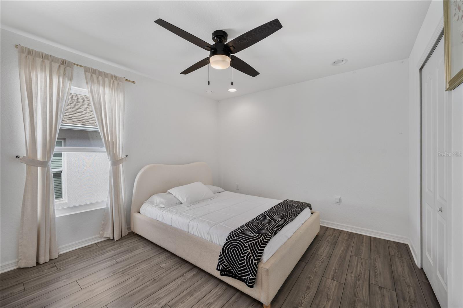 Bedroom # 2 is spacious and has a generous built in  closet