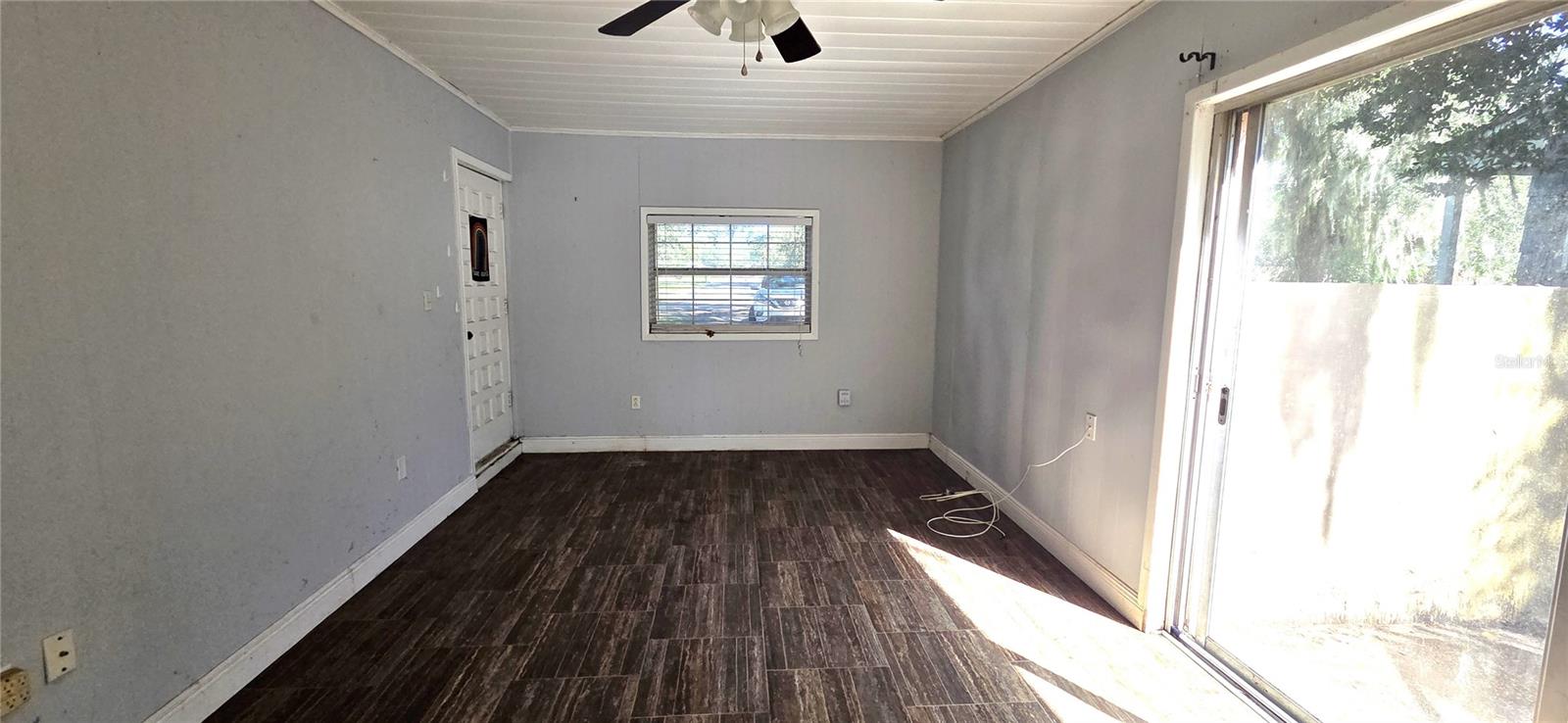 Office with separate entrance and Slider to side patio on left side of house
