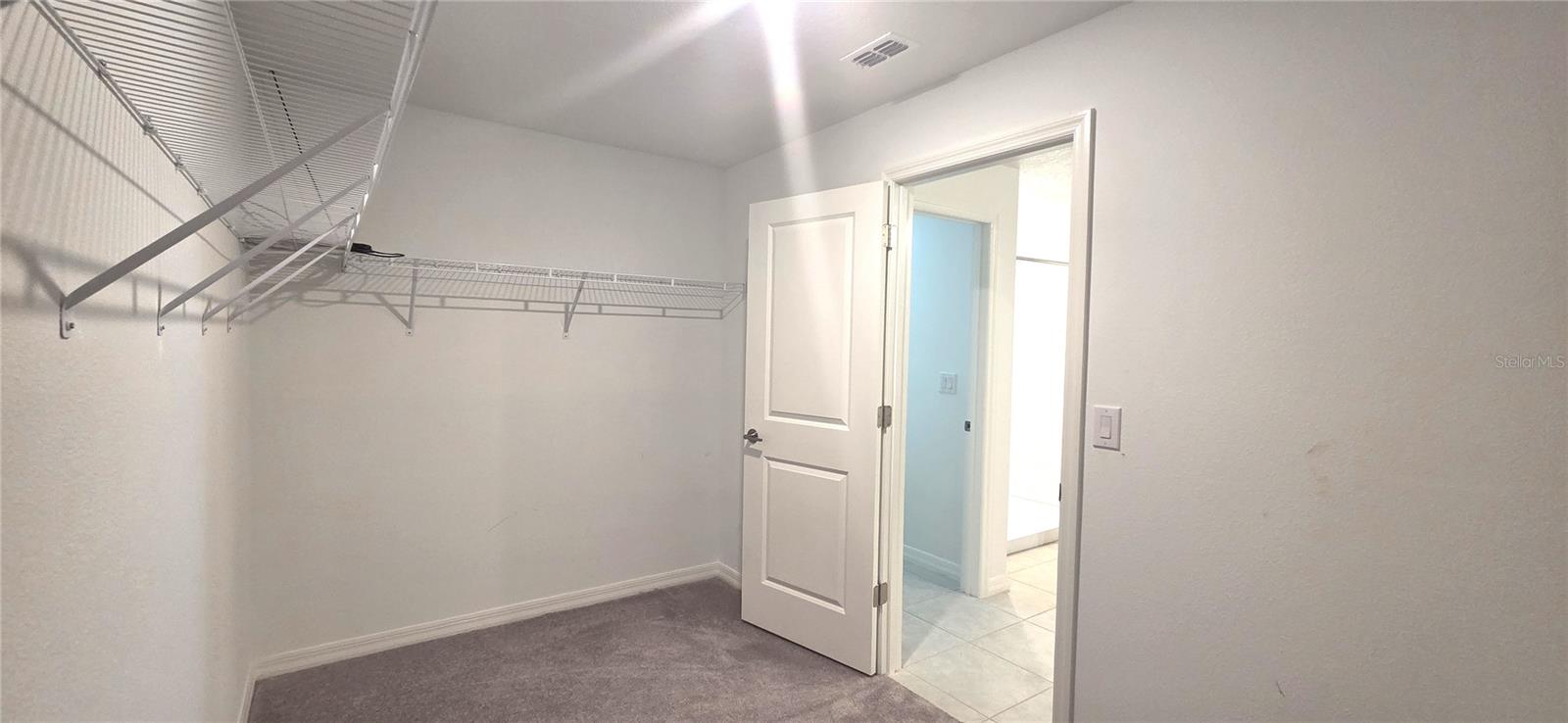 Primary Bedroom Walk-in Closet