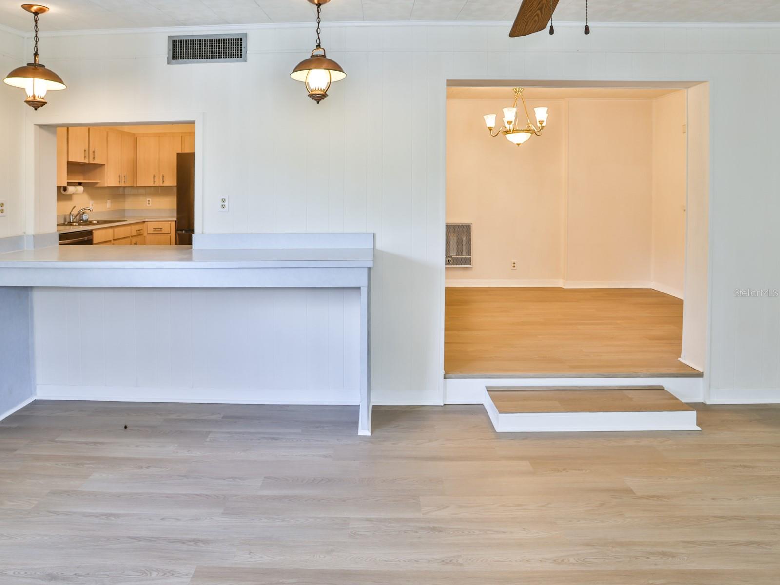 Family room with kitchen window.