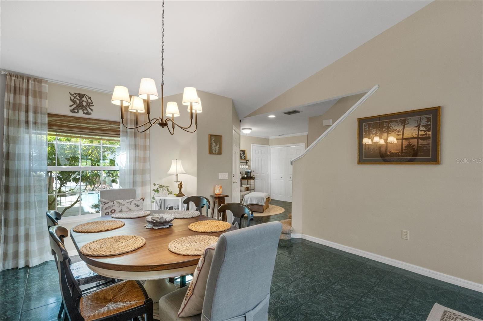 Beautiful large windows and French door allow in golden natural light. Beautiful large windows and French door allow in golden natural light.