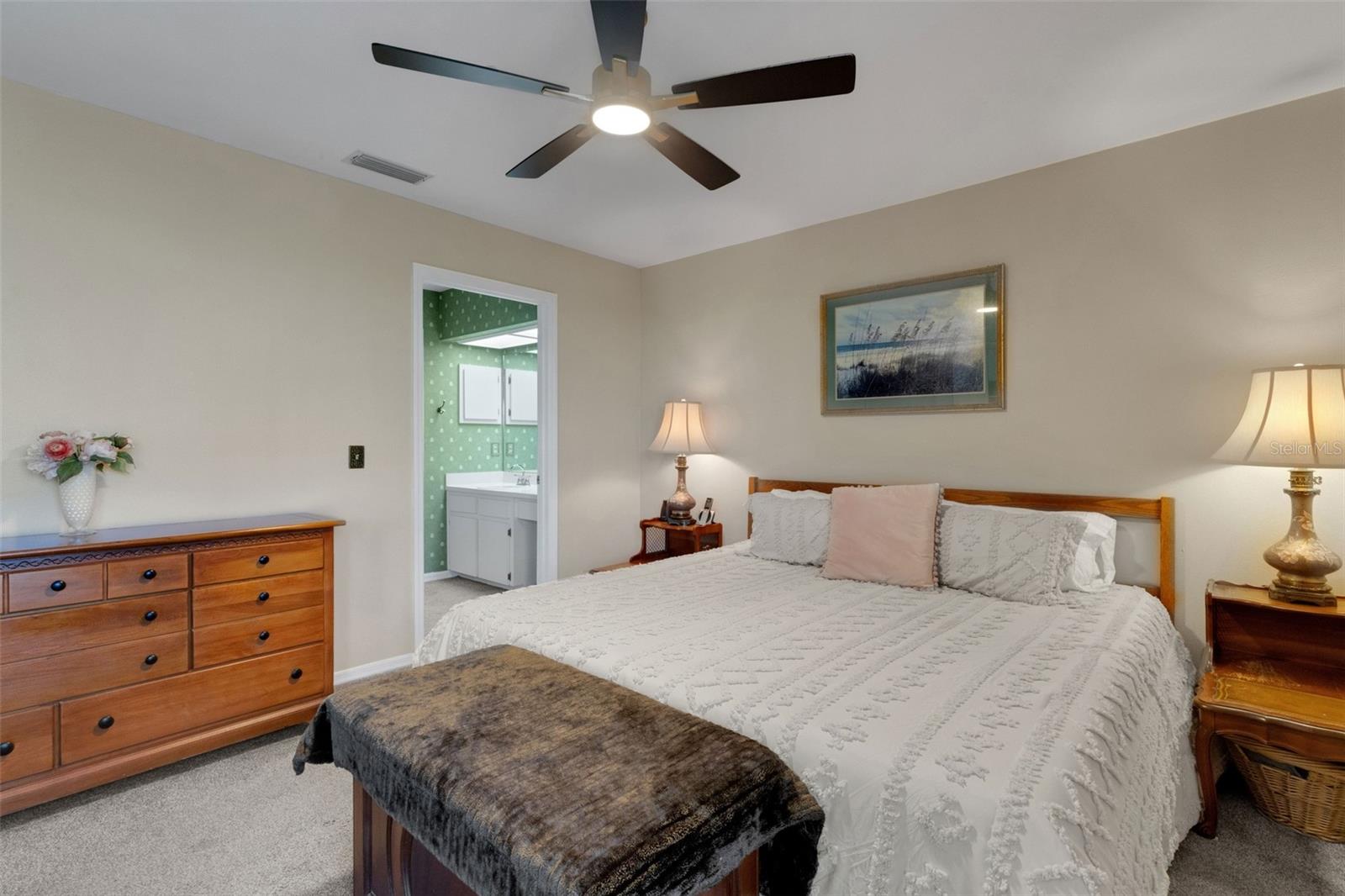 with its ensuite bathroom and walk-in closet.