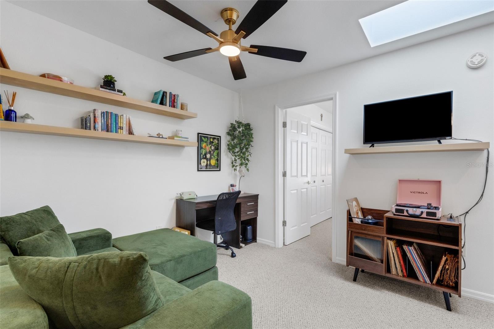 Greeting you is this cozy open loft area which could afford a multitude of uses.