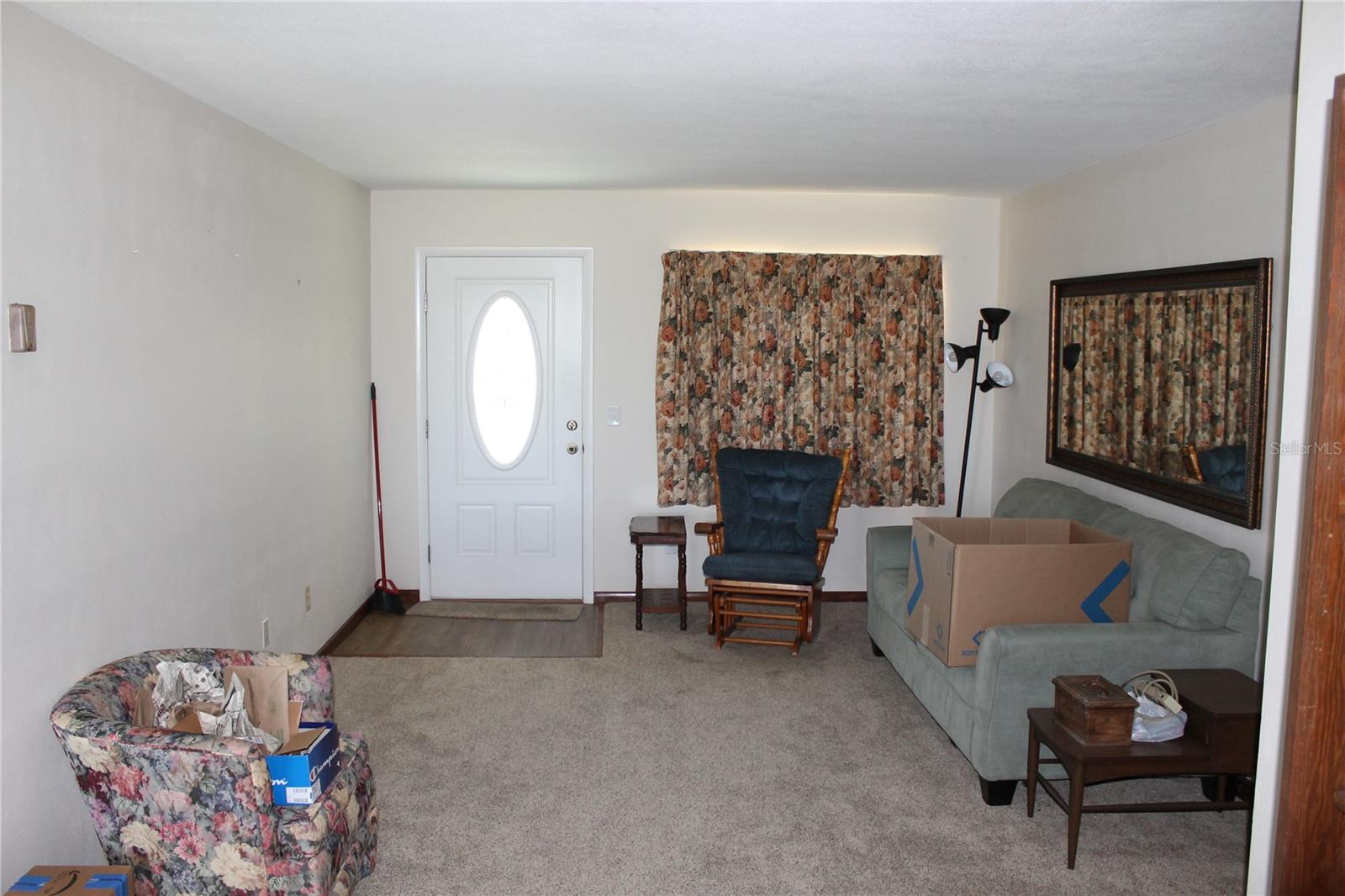 View  living room to the front door