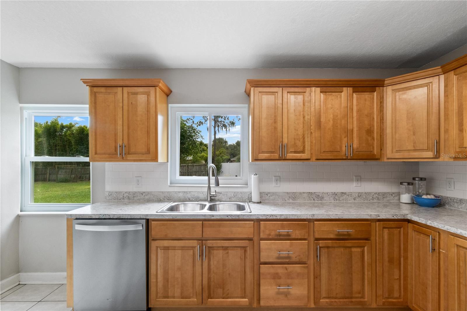 Kitchen with view of backyard