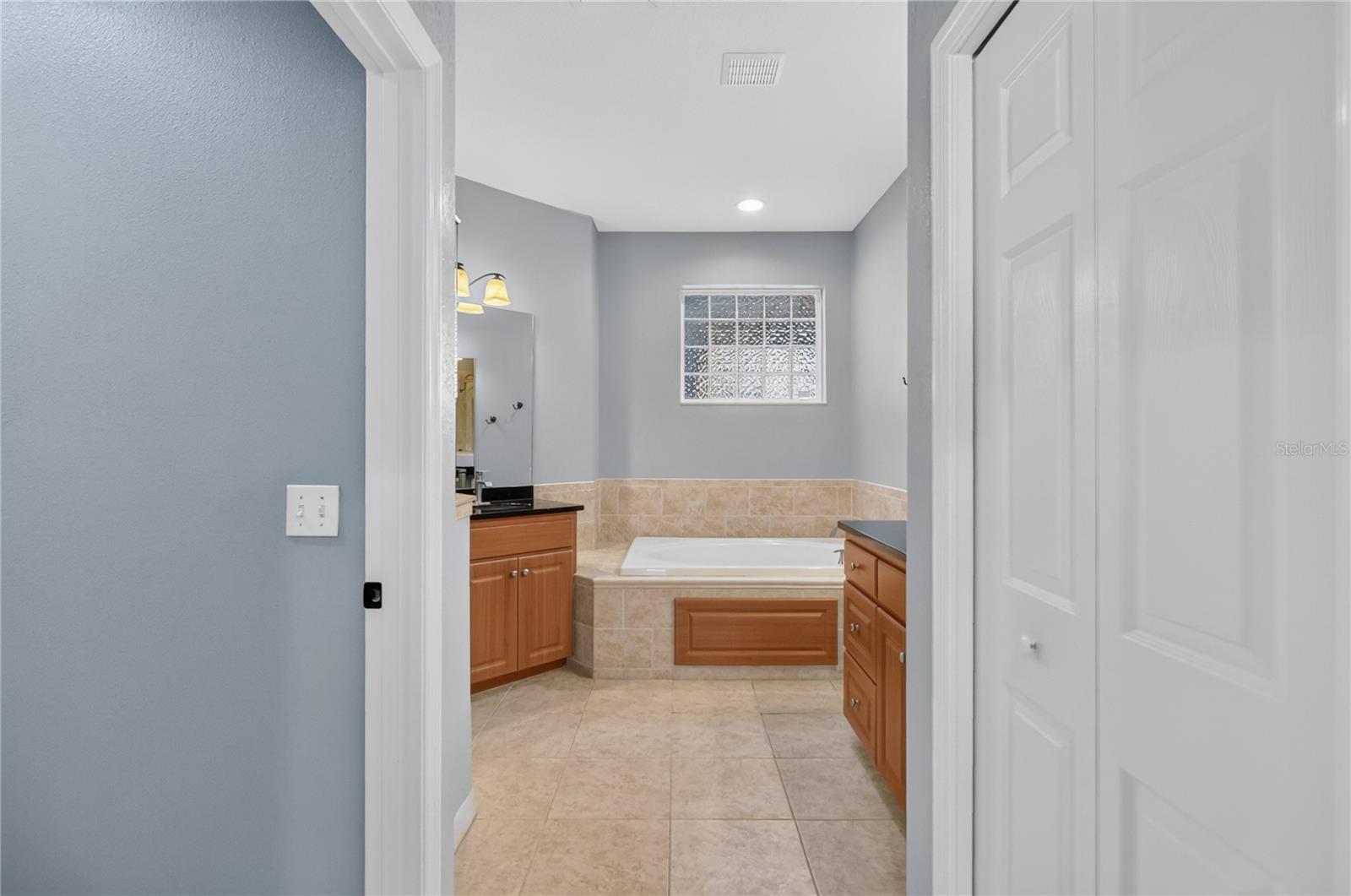 LOOKING INTO MASTER BATHROOM