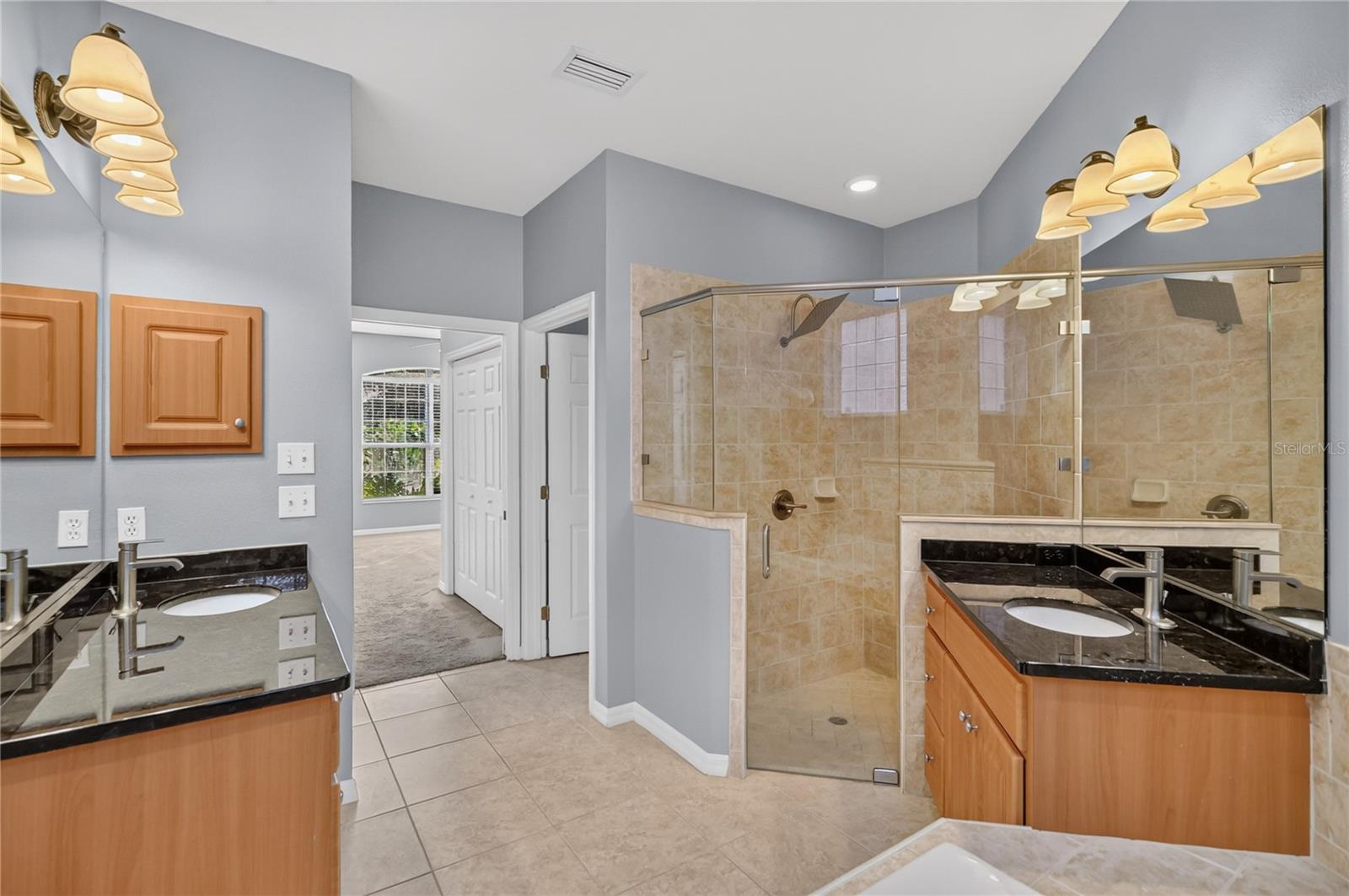 Master Bathroom with Dual Sinks and Walk In Shower