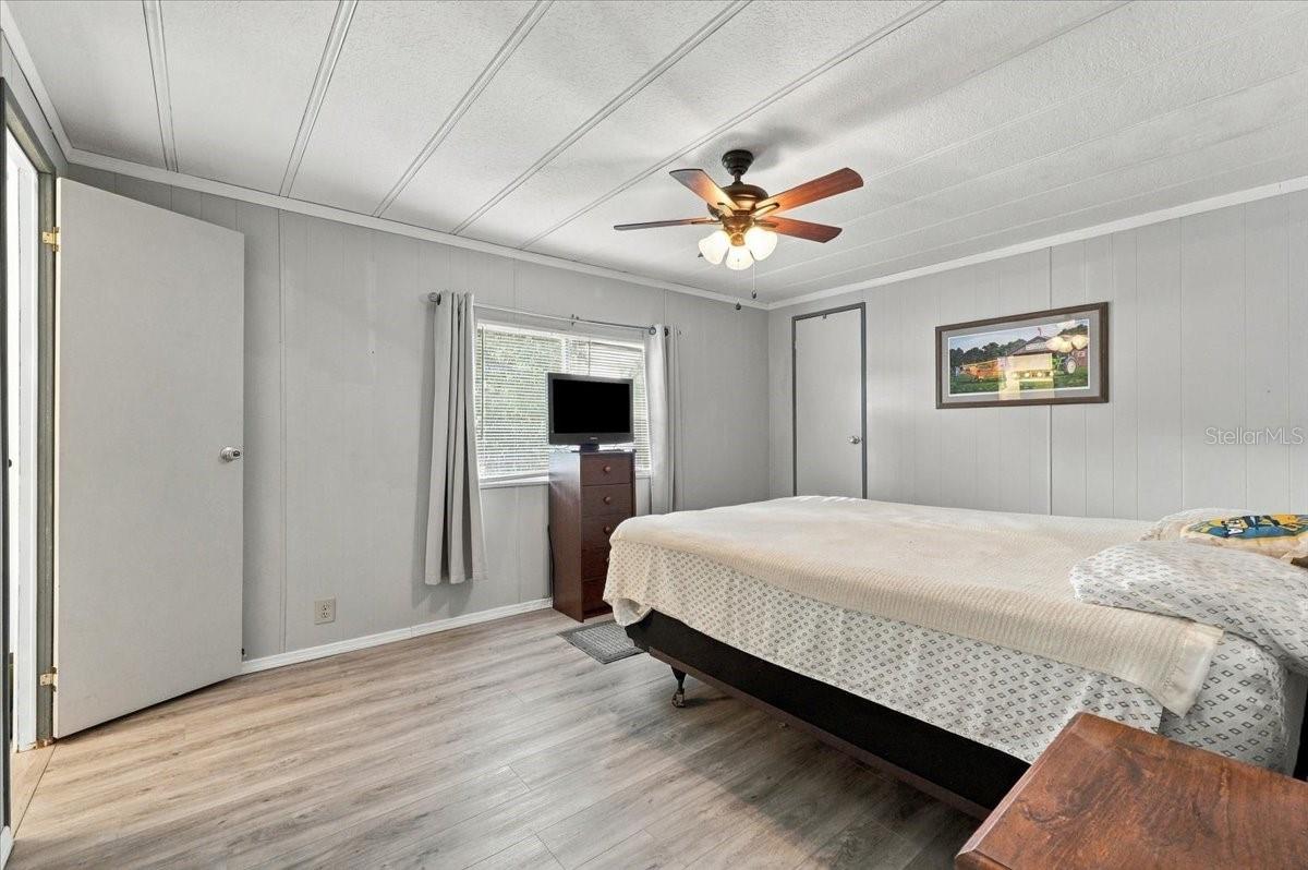 Primary bedroom with walk-in closet