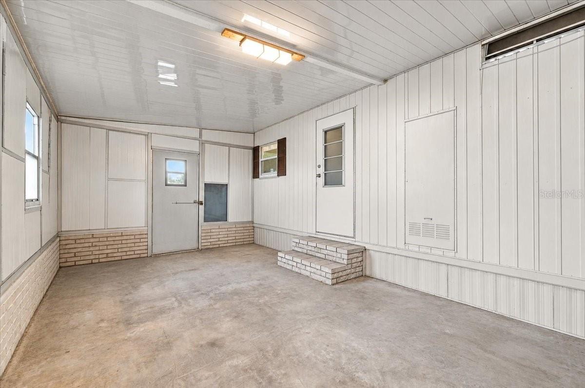 Workshop area w/ window unit AC