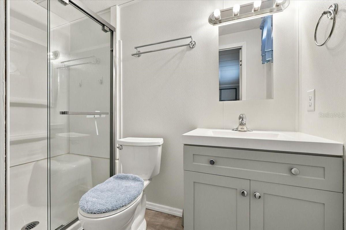 Primary bathroom with shower stall
