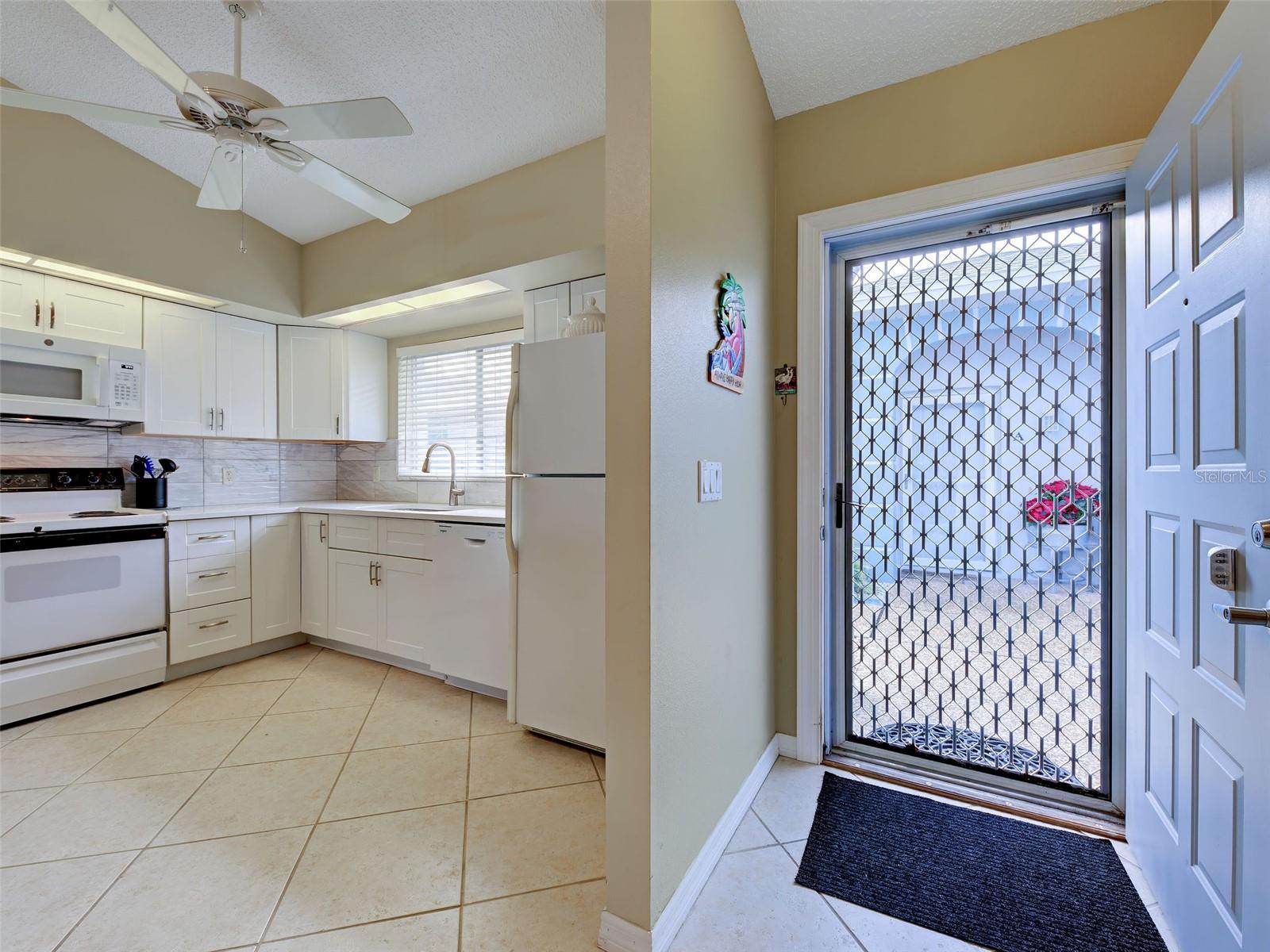 foyer into the kitchen