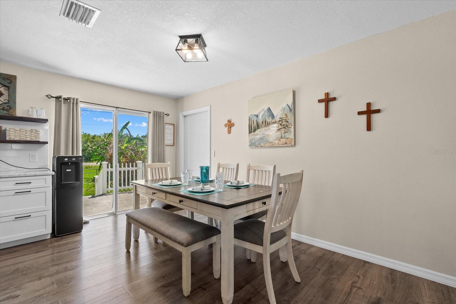 Dining area with sliding glass doors to the deck