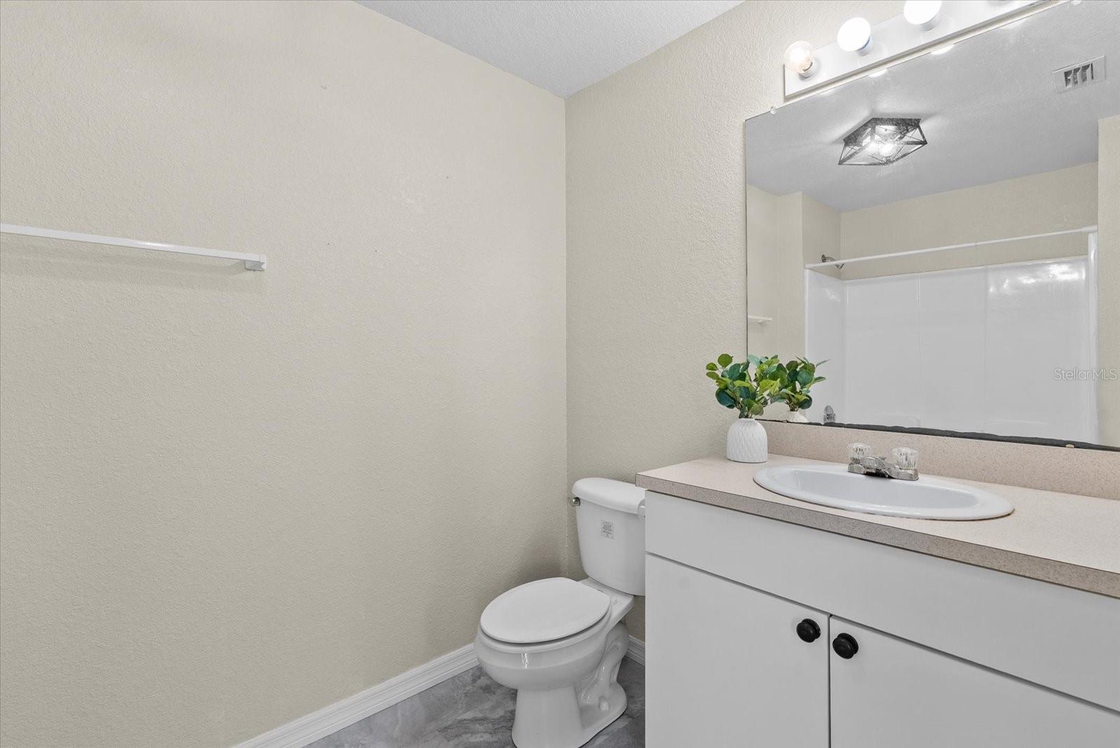 Primary bathroom with shower/tub combination